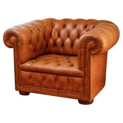 Vintage Comfortable leather Chesterfield armchair