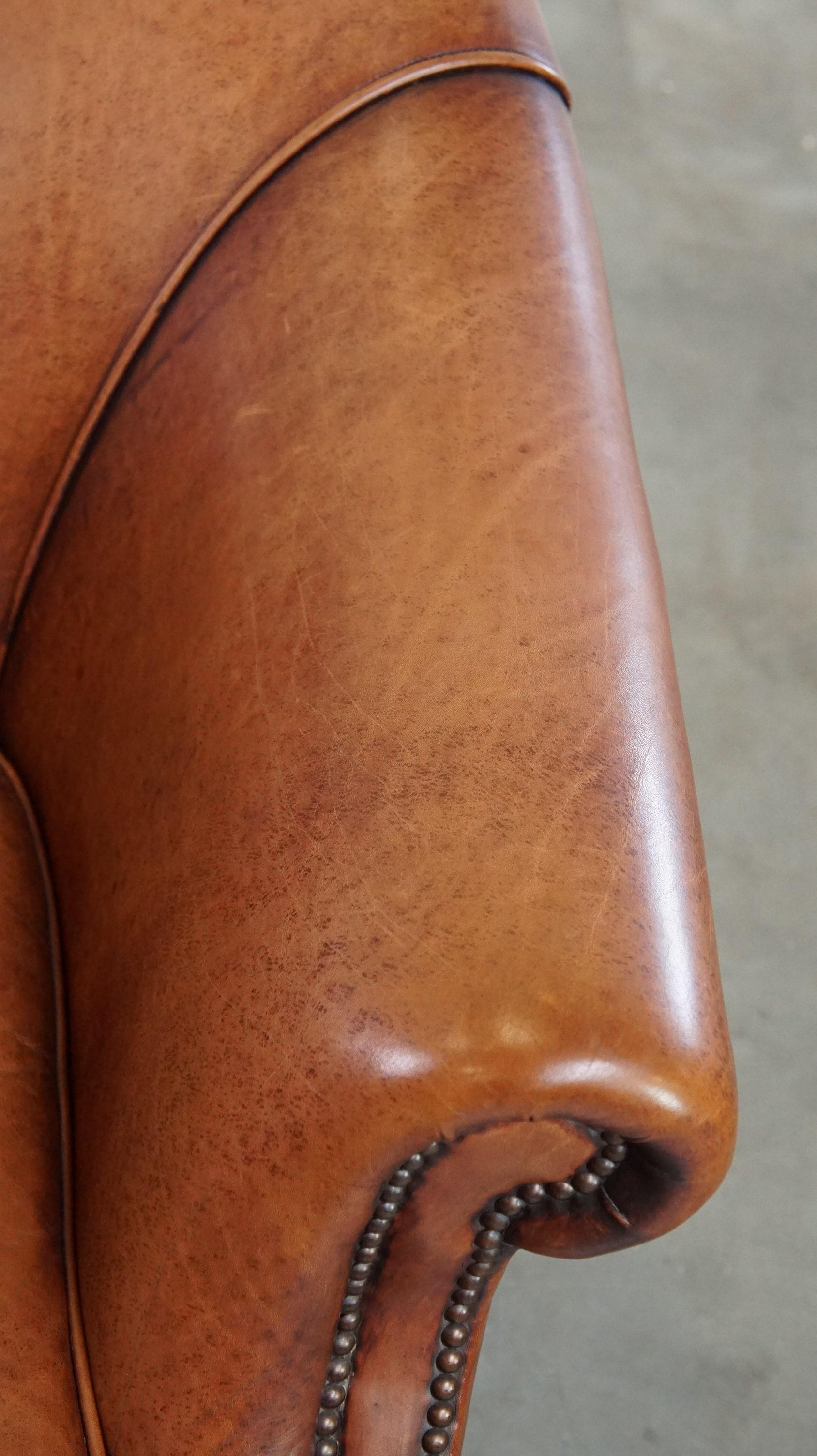 Comfortable leather club armchair with a loose seat cushion 2
