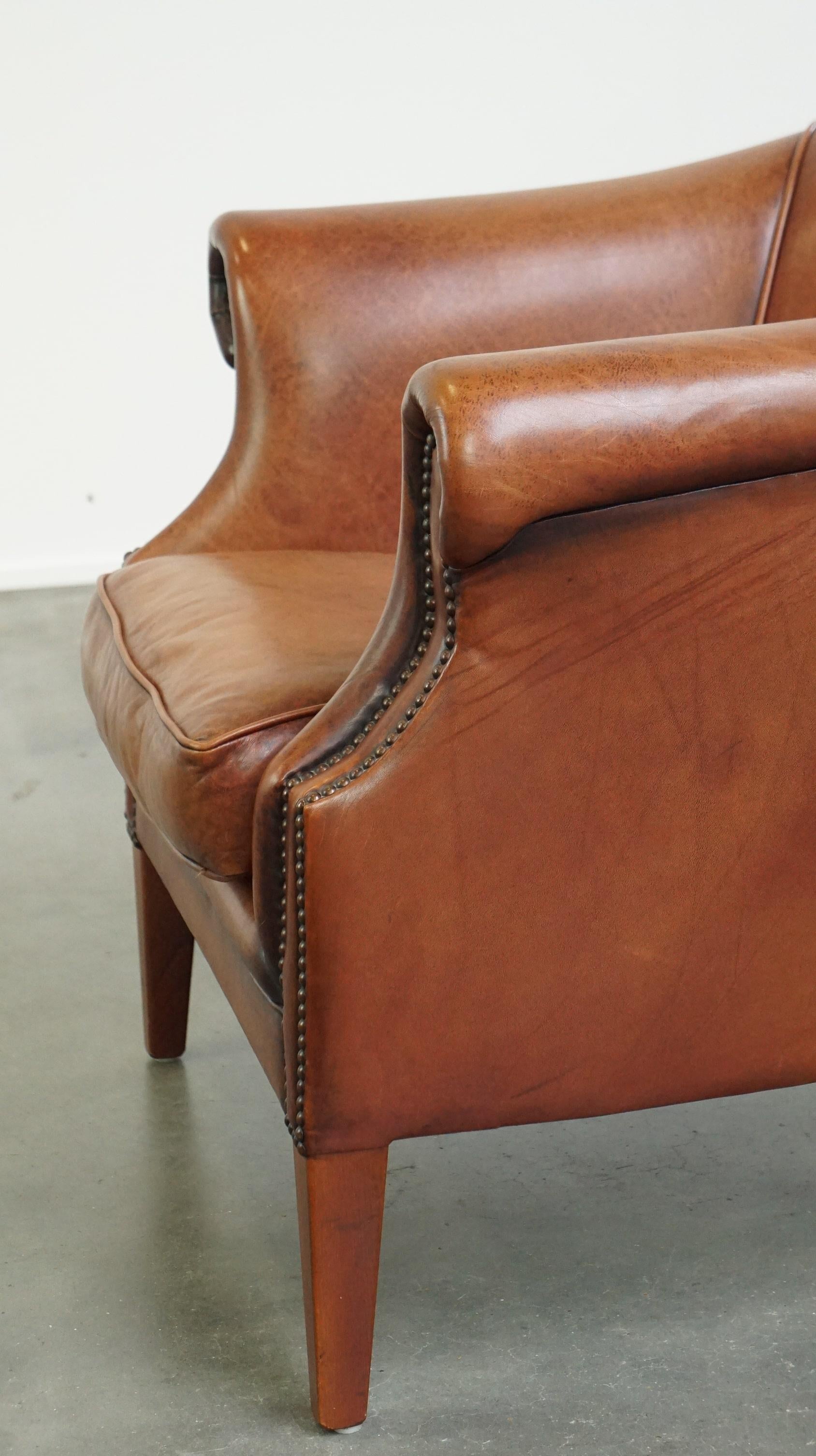 Comfortable leather club armchair with a loose seat cushion 3