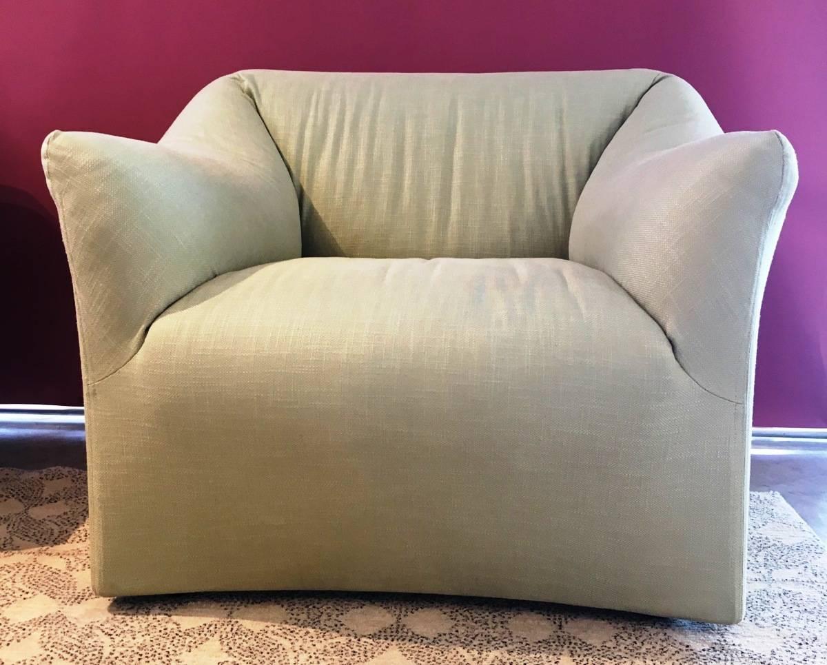 Cassina tentazione club chair upholstered in light green linen. Fabric is completely removable for cleaning and new covers can be ordered from Cassina. Retail price for these chairs is $6,190.