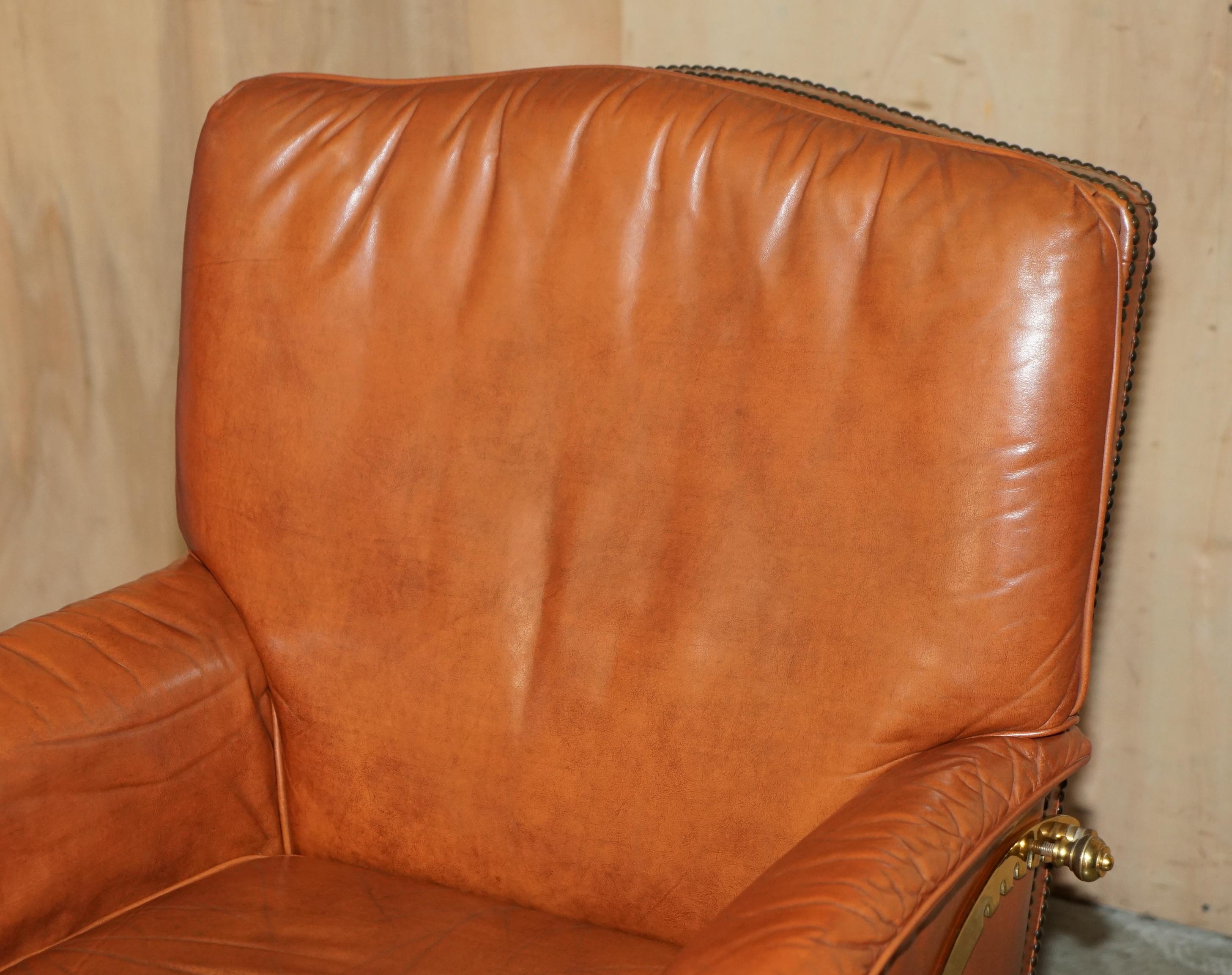 French COMFORTABLE PAiR OF FRENCH NEOCLASSICAL STYLE LEATHER & BRASS RECLINER ARMCHAIRS For Sale
