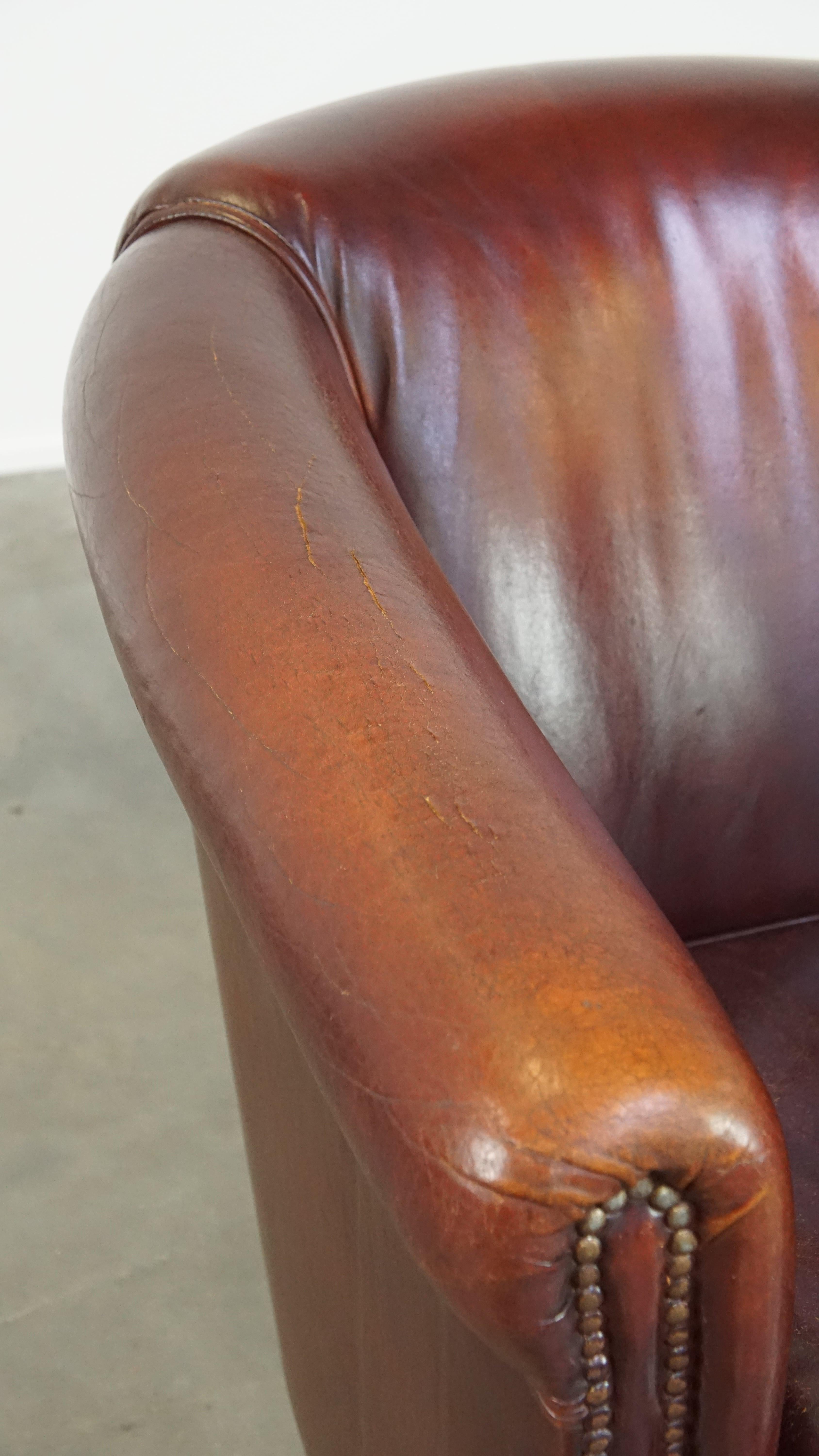Comfortable, rugged cognac-colored sheepskin club armchair For Sale 7