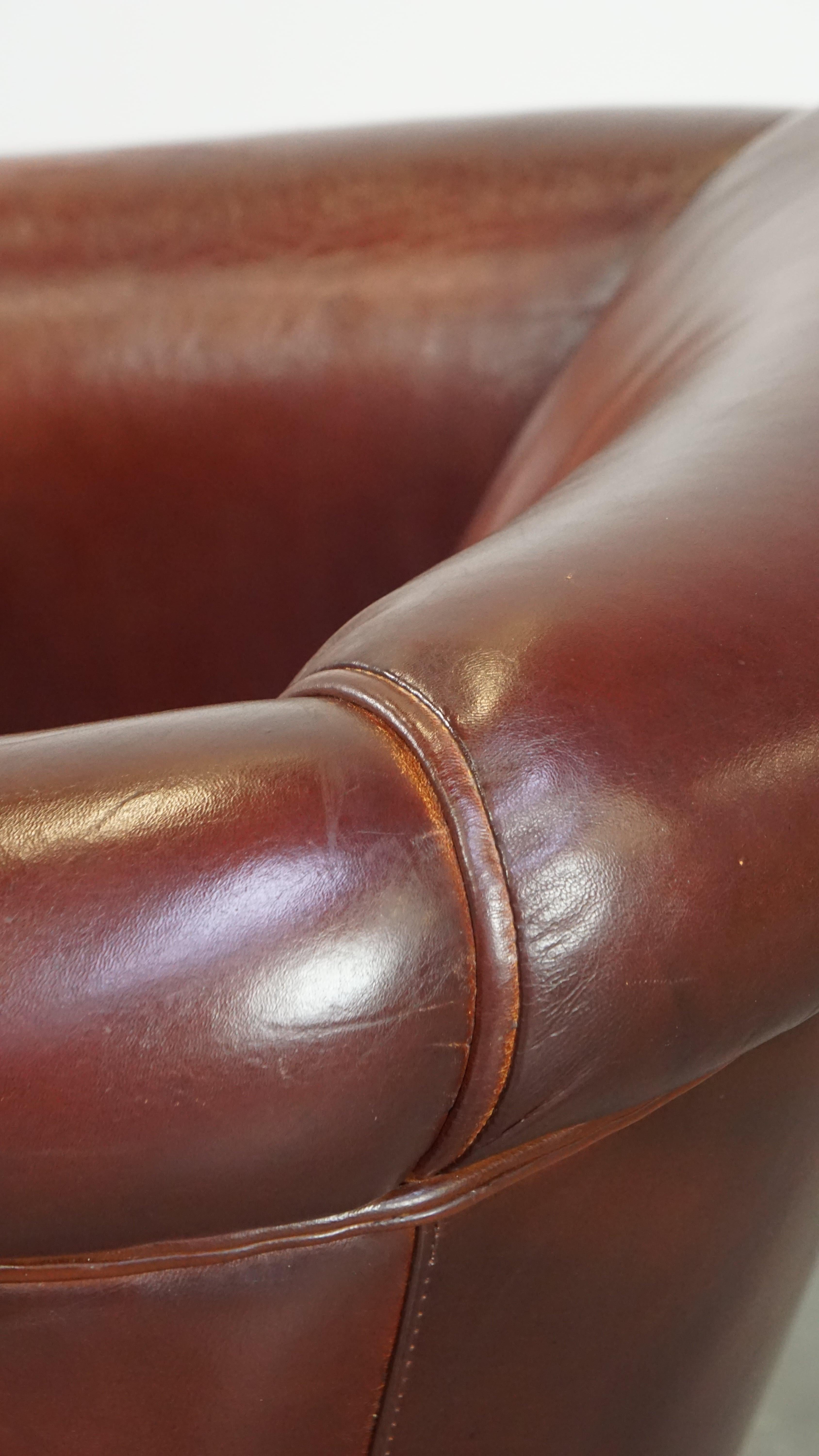 Comfortable, rugged cognac-colored sheepskin club armchair For Sale 3