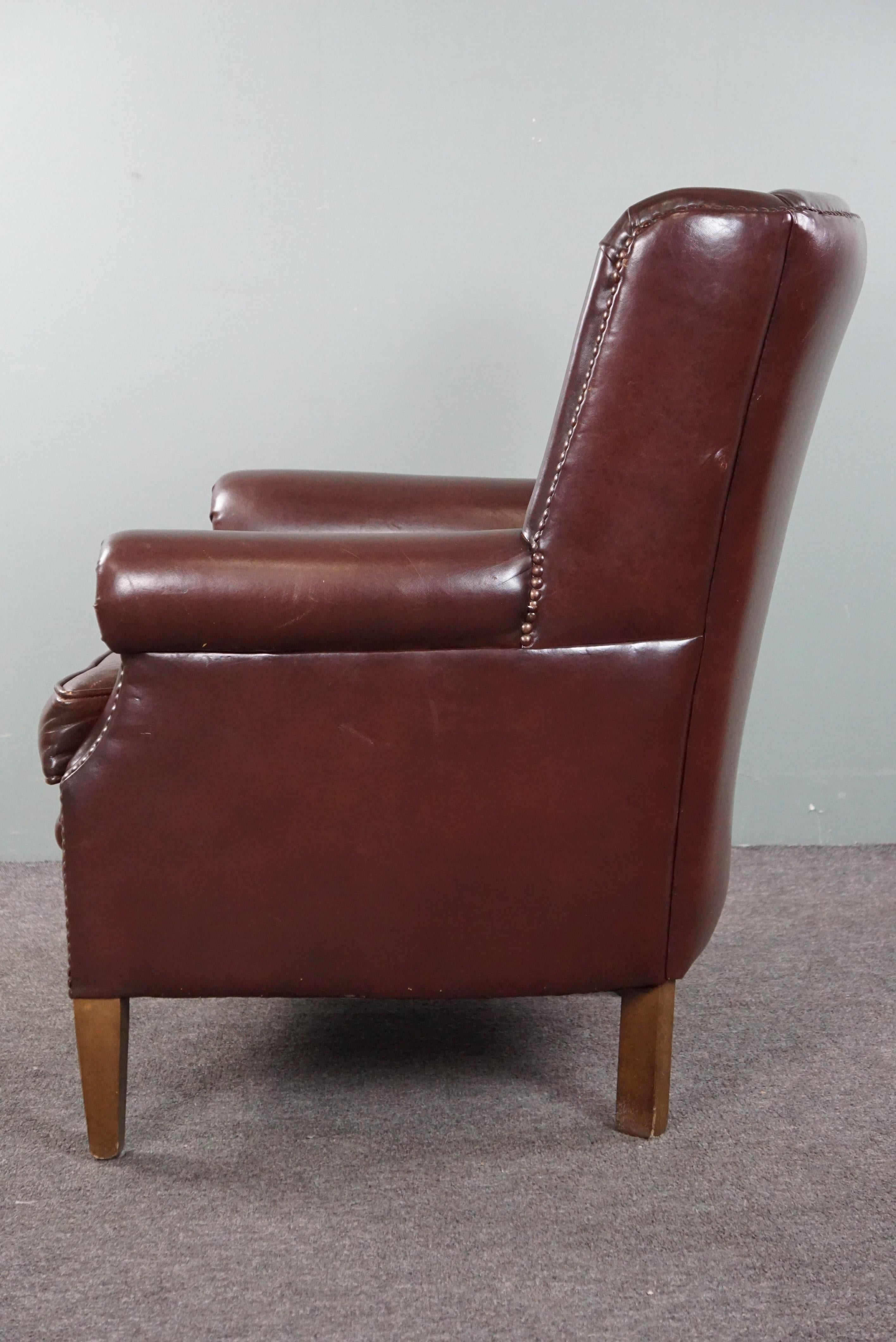 Leather Comfortable sheep leather armchair in a beautiful warm color For Sale