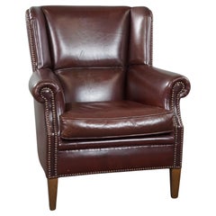 Retro Comfortable sheep leather armchair in a beautiful warm color