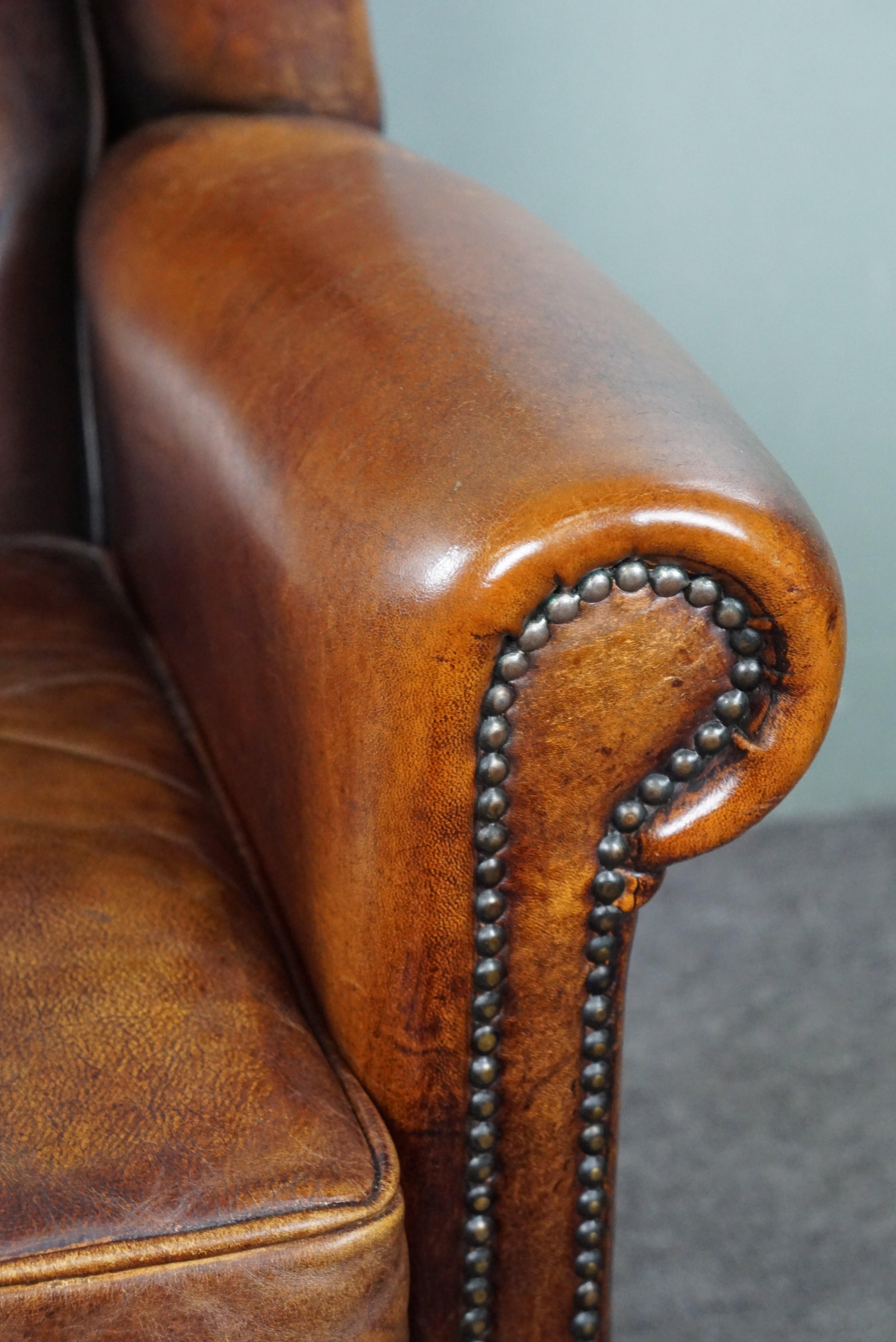 Late 20th Century Comfortable sheep leather wingback chair with unbelievably warm colors For Sale