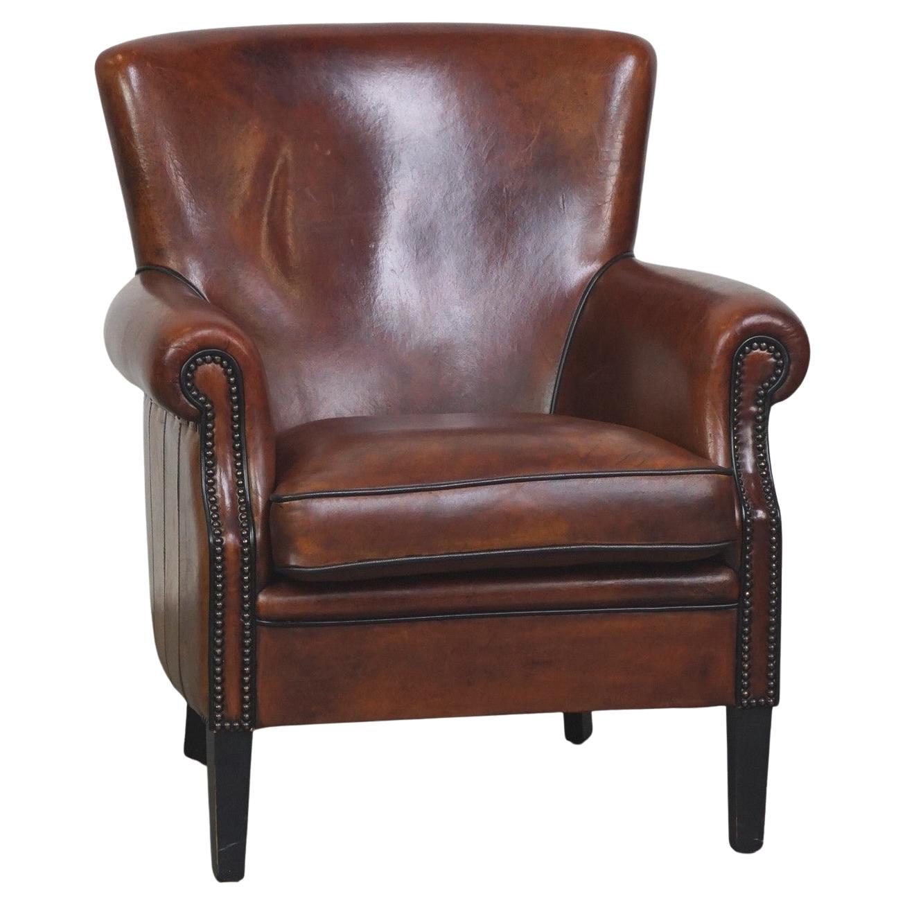 Comfortable sheepskin armchair with a beautiful finish and deep color