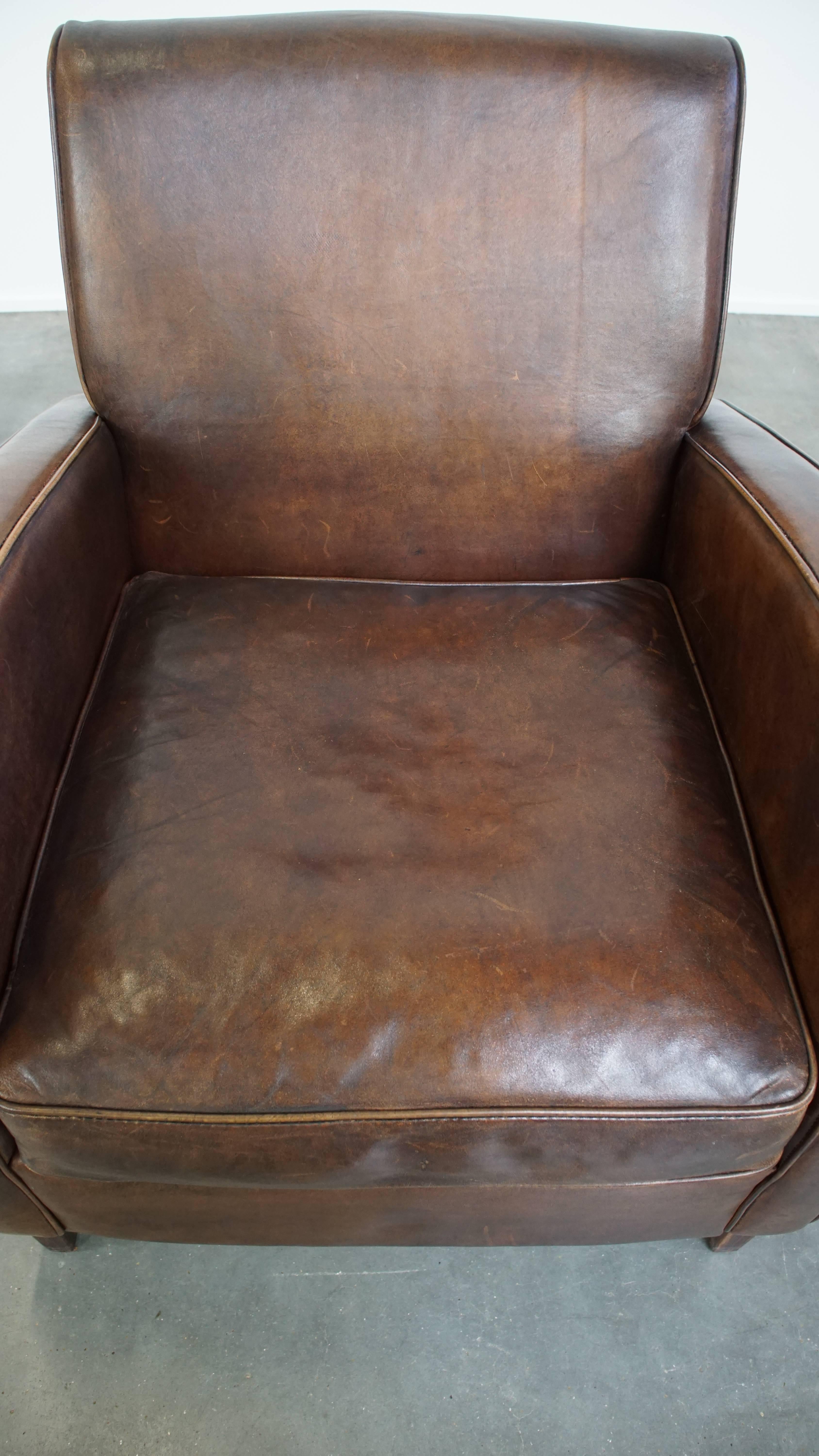 20th Century Comfortable Sheepskin Leather Armchair with a Beautiful Patina For Sale