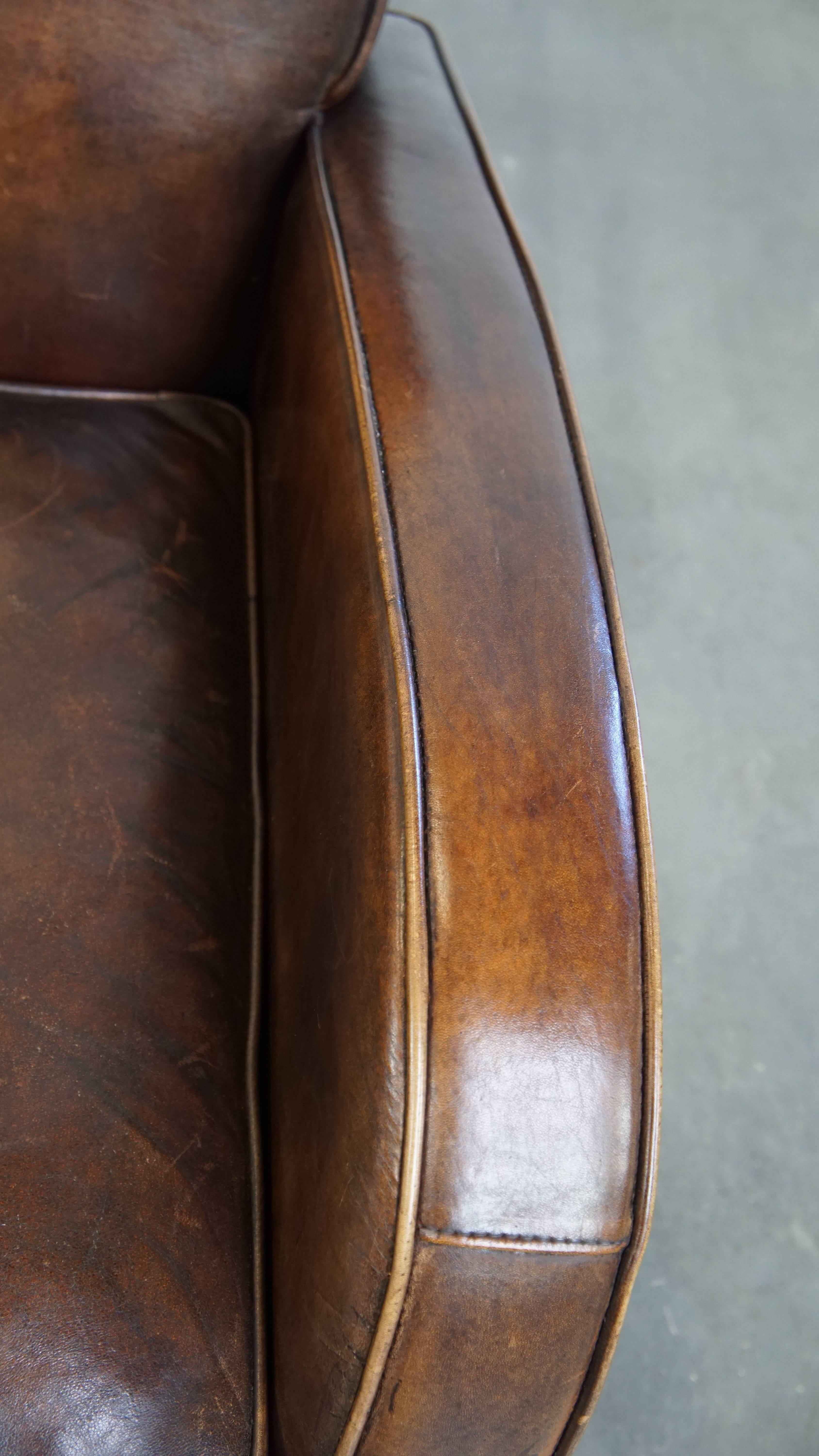 Comfortable Sheepskin Leather Armchair with a Beautiful Patina For Sale 2