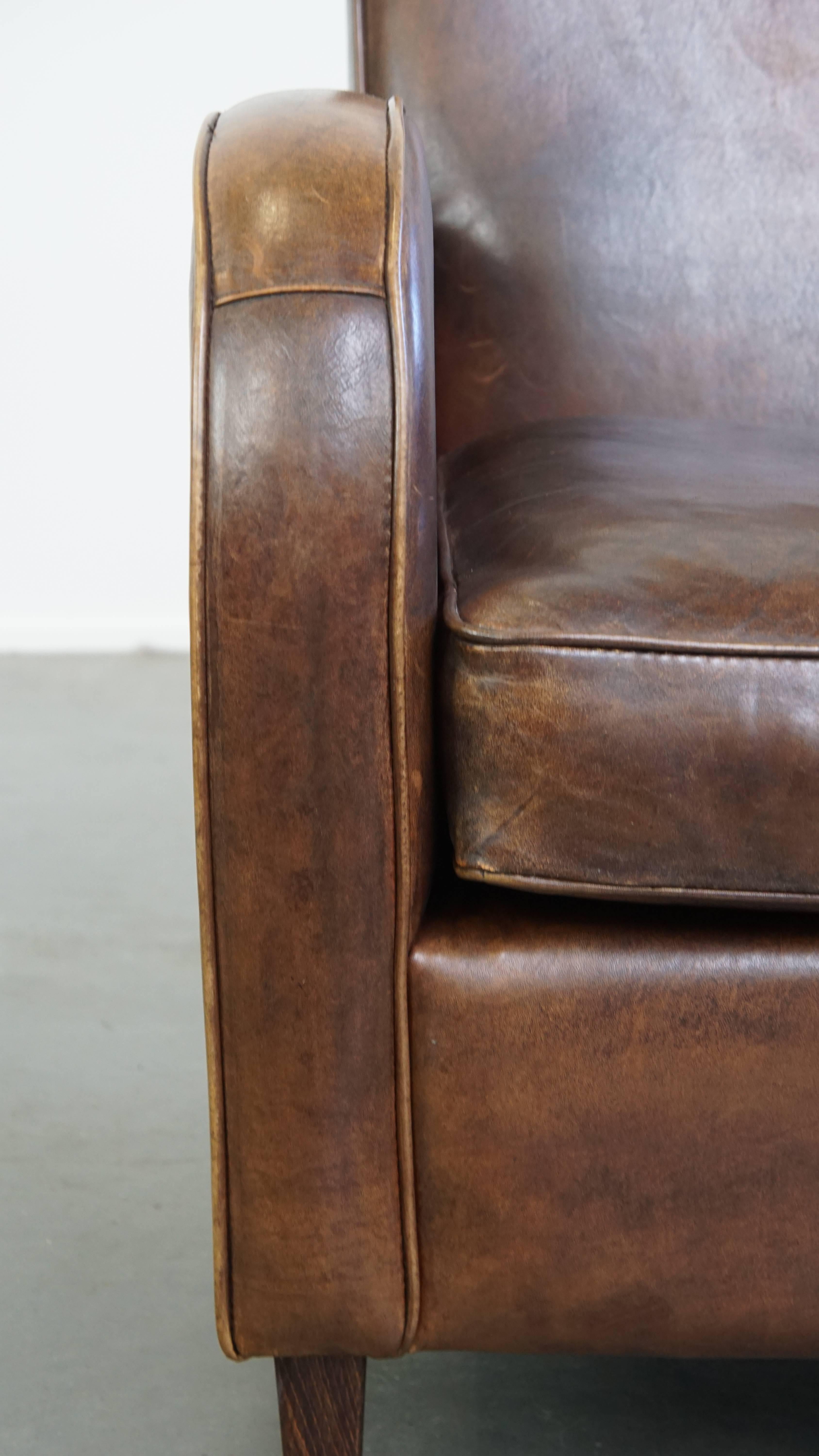 Comfortable Sheepskin Leather Armchair with a Beautiful Patina For Sale 3