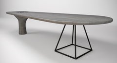 Comfortable Table Drop of Concrete with Rounded Shapes for Minimalist Interior