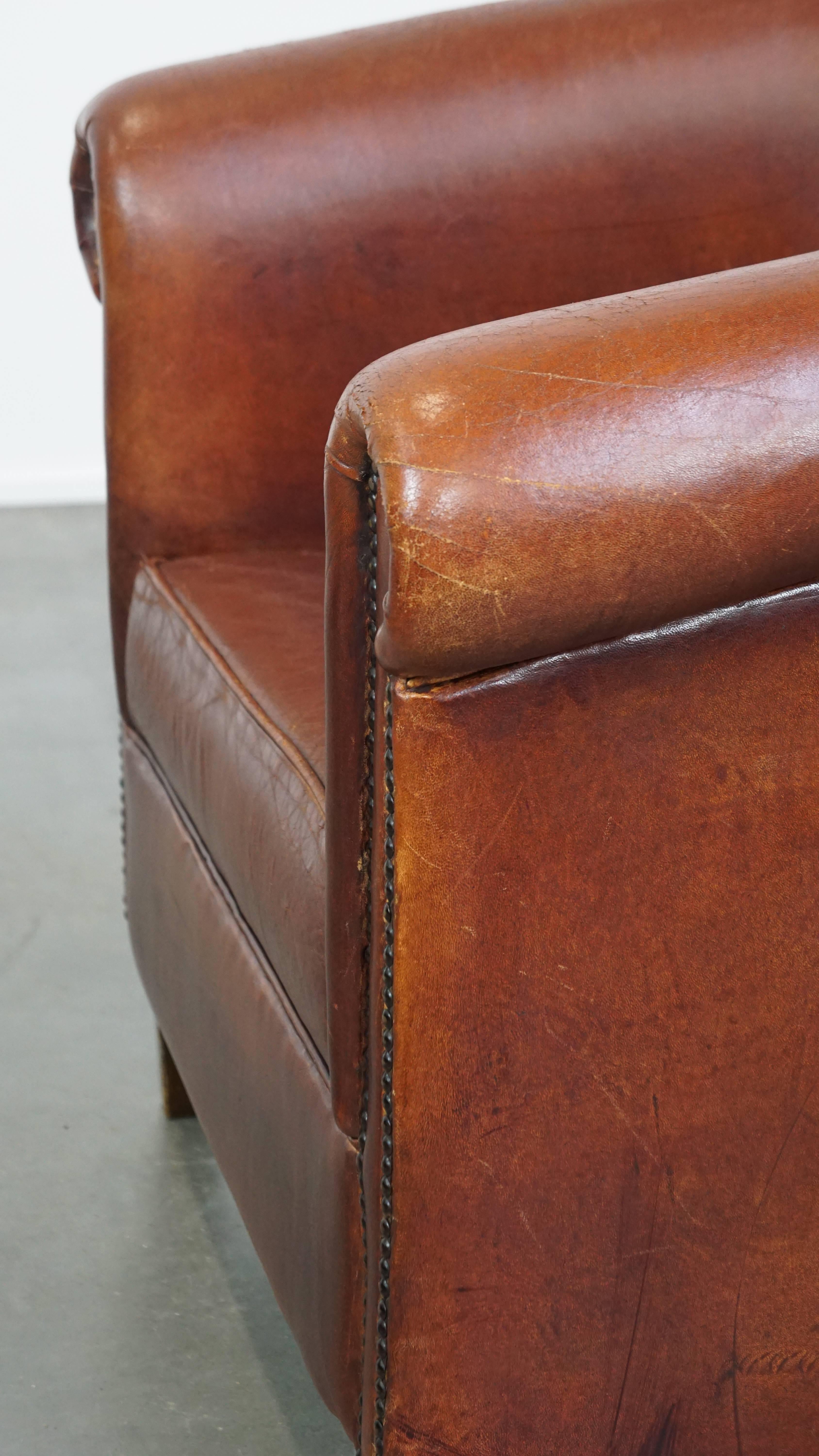 Comfortable vintage English style sheepskin club chair with a beautiful patina For Sale 6
