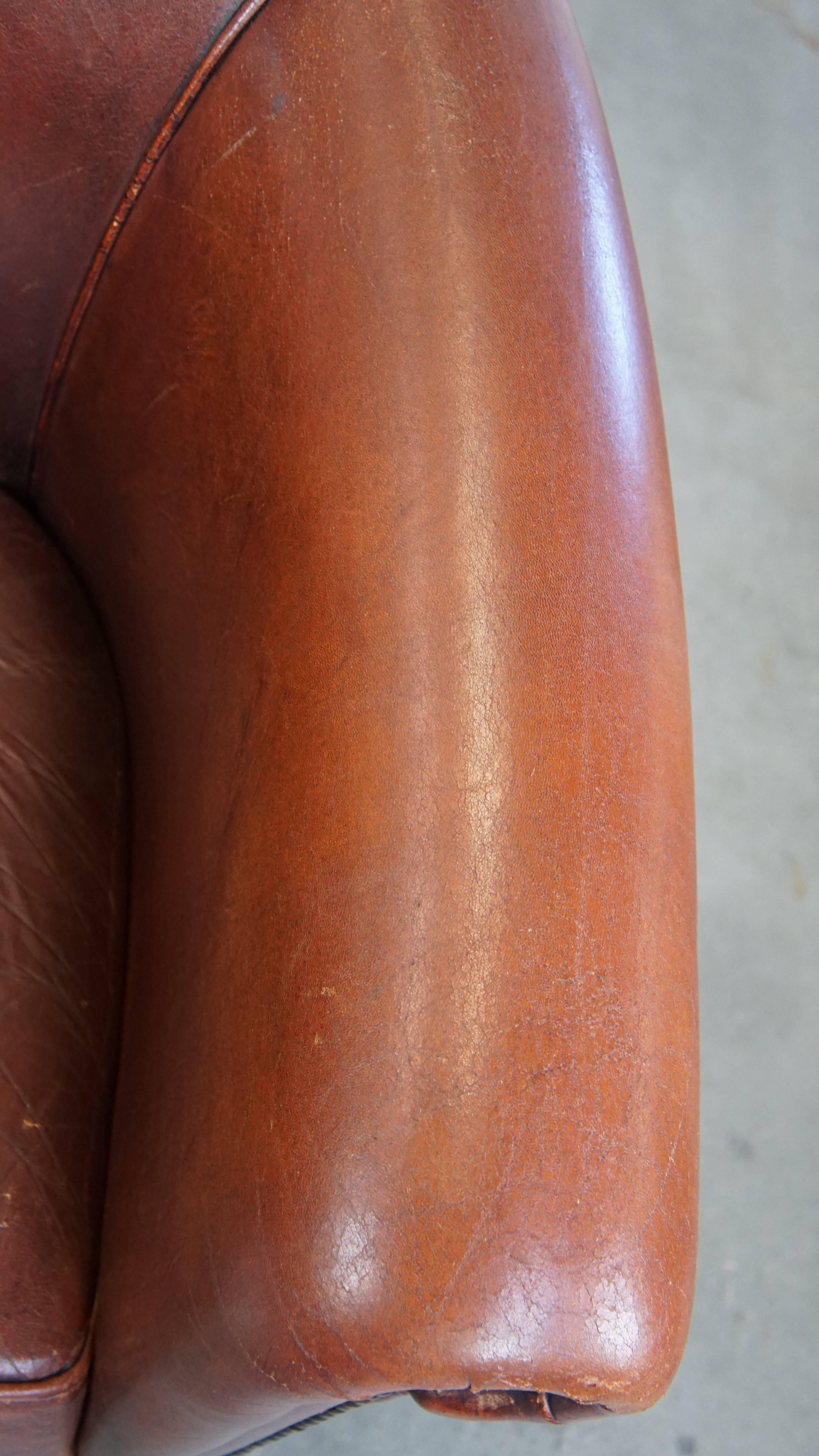 Comfortable vintage English style sheepskin club chair with a beautiful patina For Sale 1