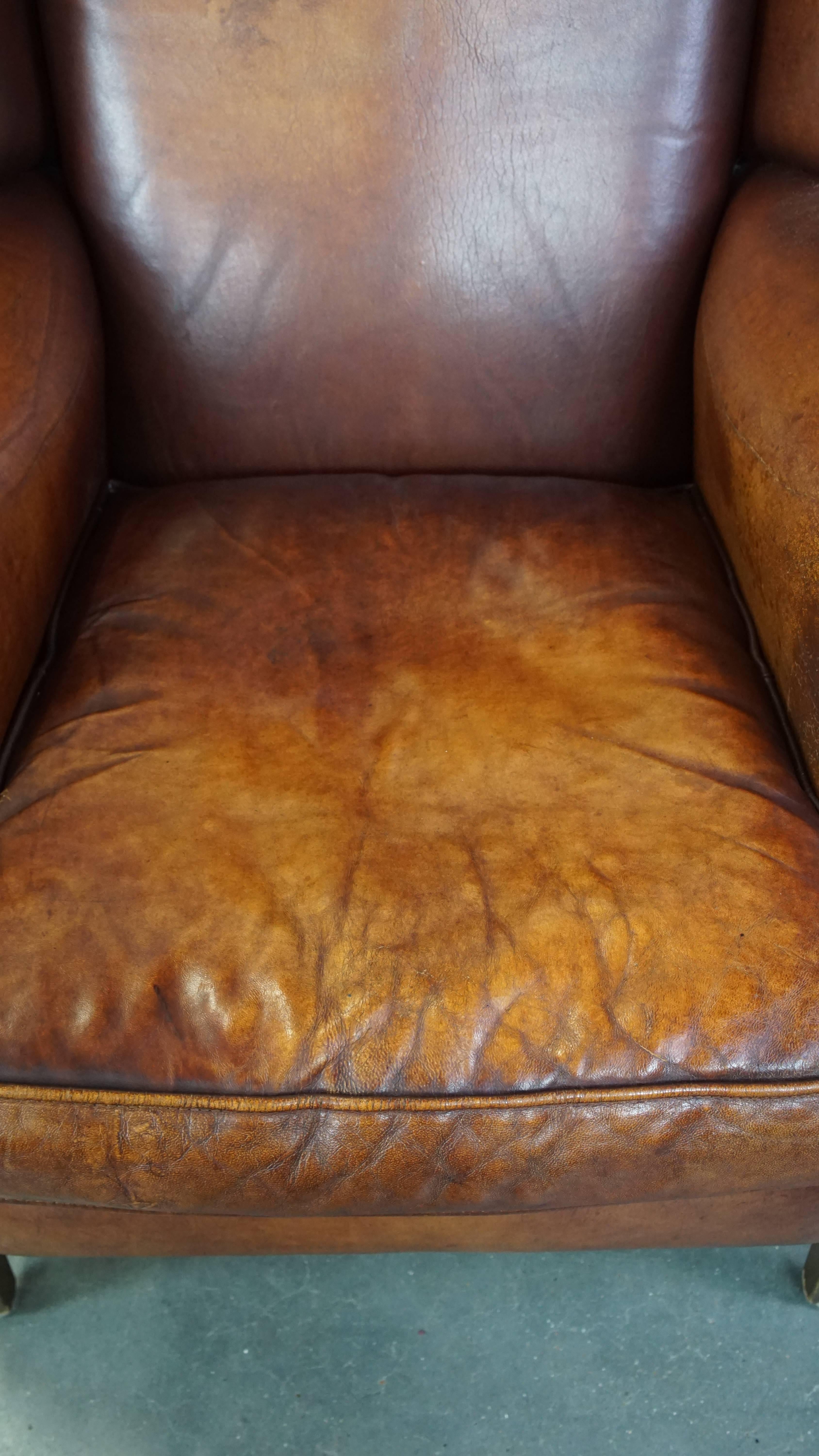 20th Century Comfortable Vintage English-Style Sheepskin Leather Wingback Armchair For Sale