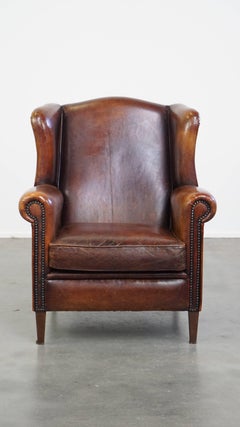 Comfortable Vintage Sheepskin Wingback Chair with a Beautiful Color