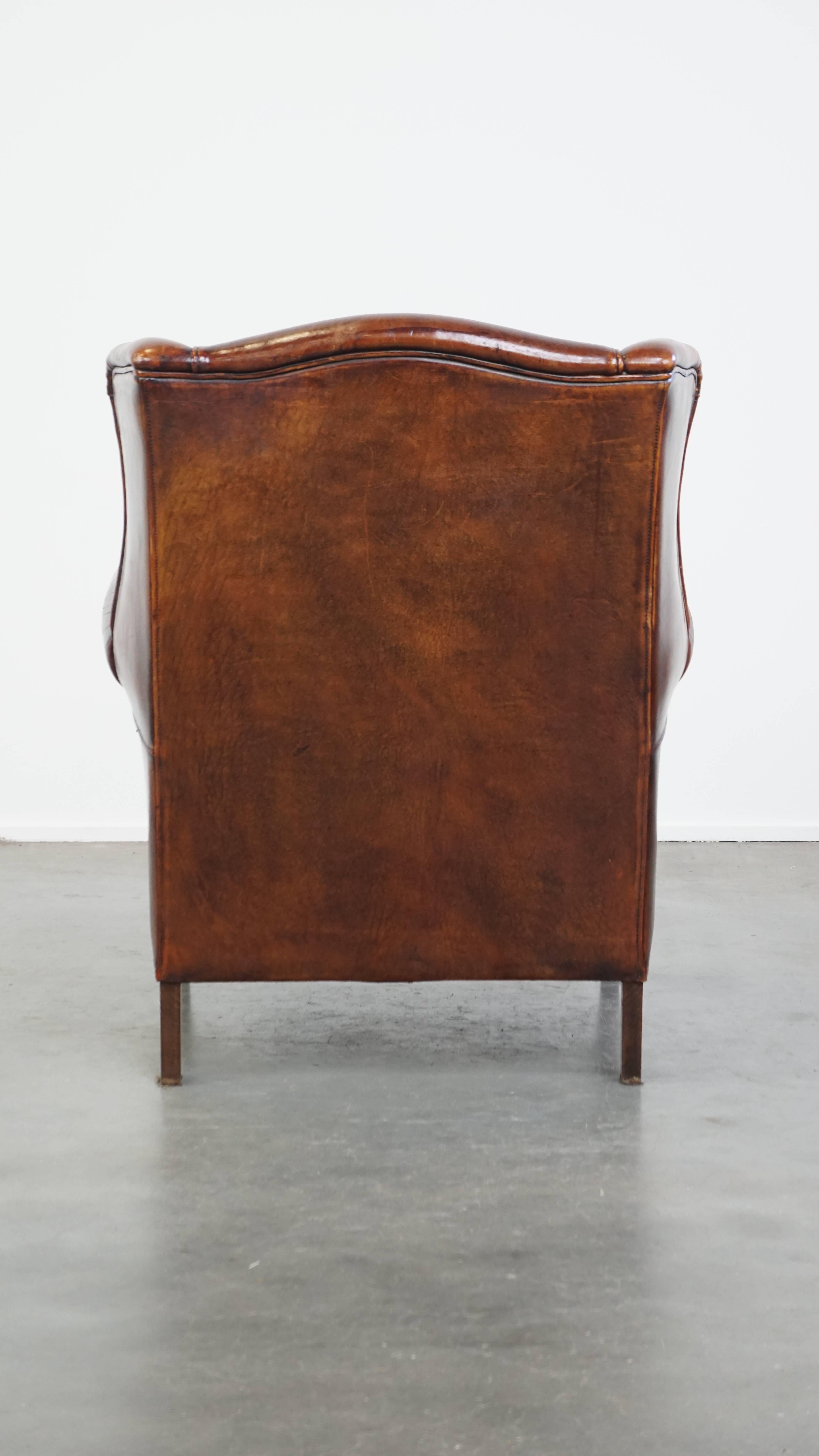 Hand-Crafted Comfortable Vintage Sheepskin Wingback Chair with a Beautiful Color For Sale