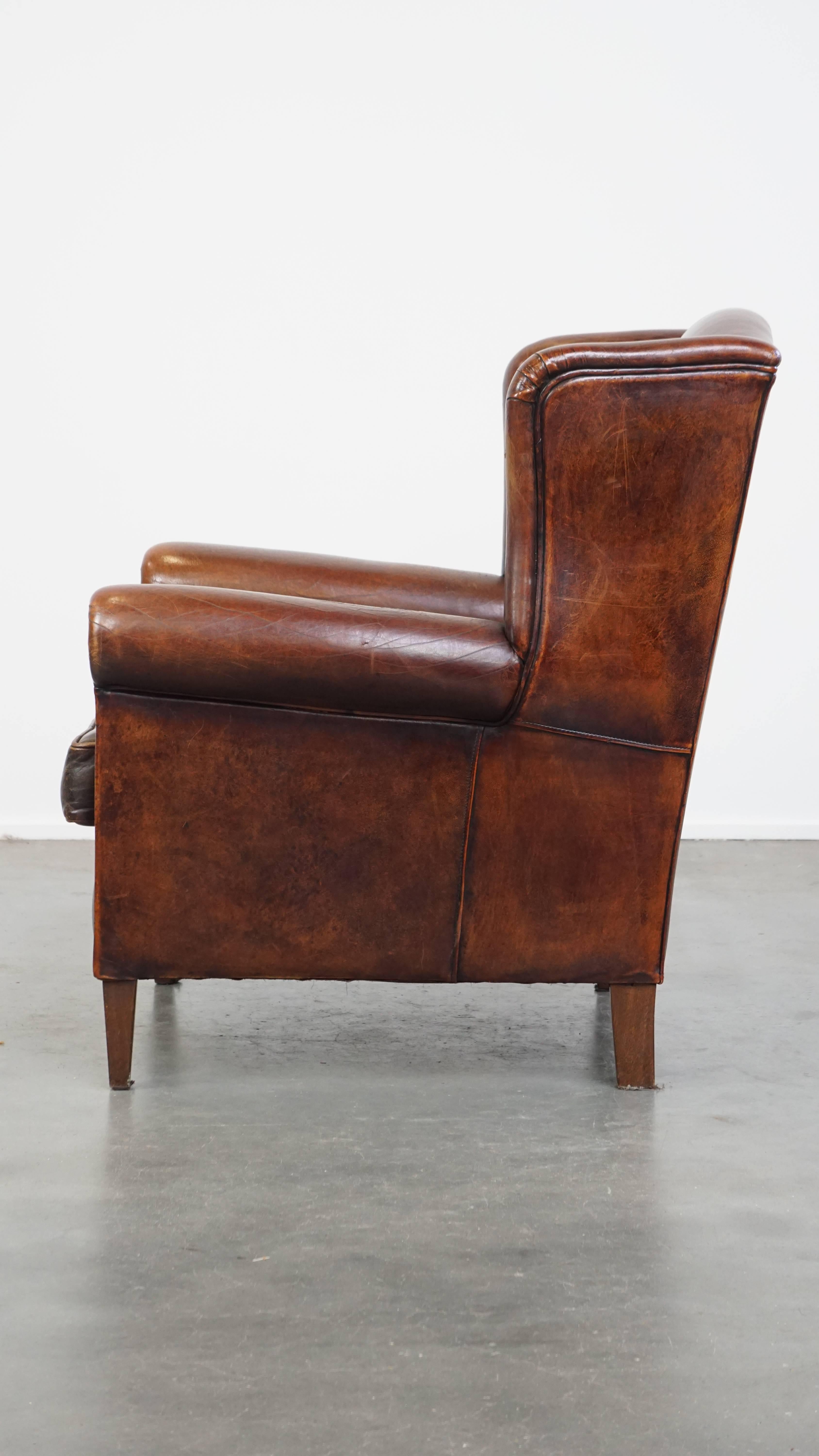 Comfortable Vintage Sheepskin Wingback Chair with a Beautiful Color In Good Condition For Sale In Harderwijk, NL