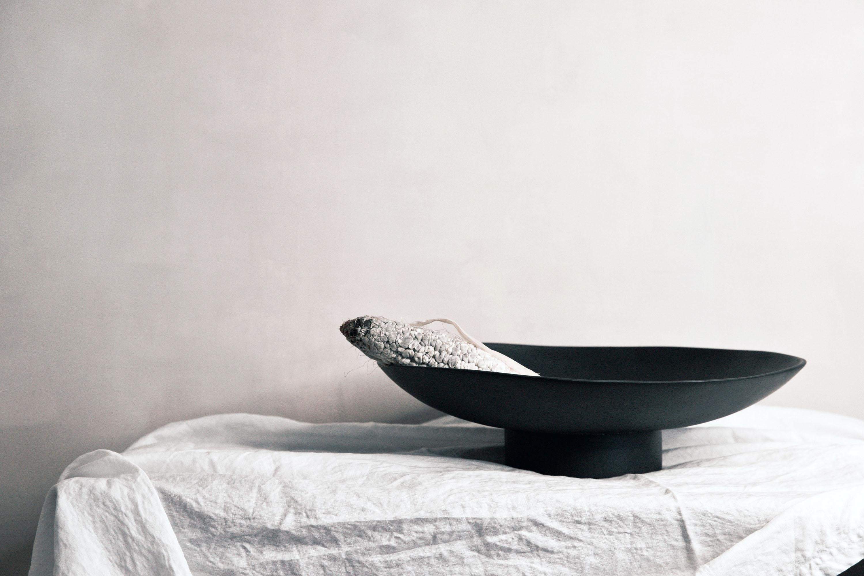 A striking resin bowl that makes a great centerpiece

This resin bowl comes in two variations: one is all black resin, and one is made from a mix of black and clear resin that blend together in swirls and clouds reminiscent of ink dissolving in