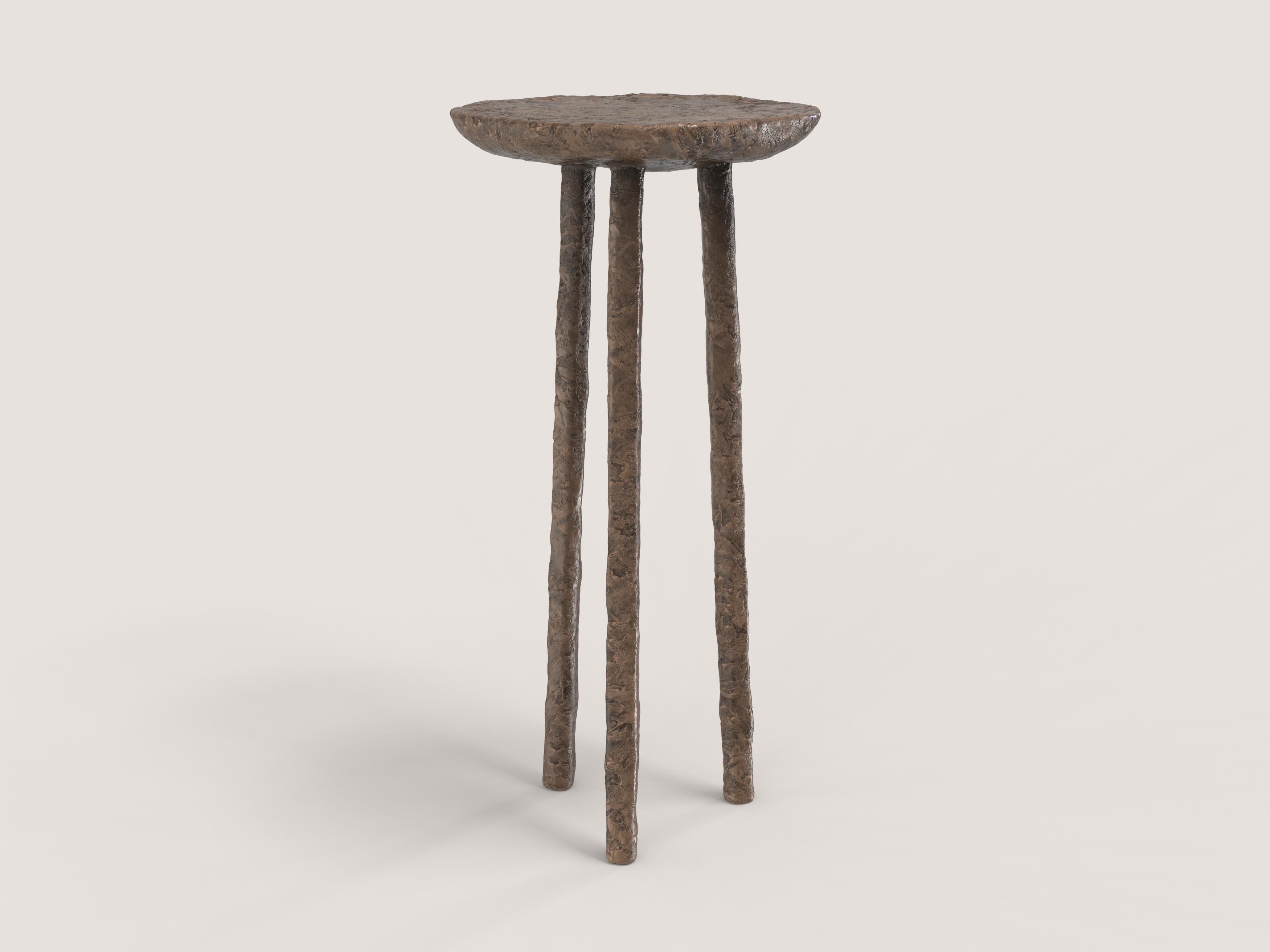 Comma V3 High Stool by Edizione Limitata
Limited edition of 150 pieces. Signed and numbered.
Dimensions: D 34 x W 34 x H 75 cm.
Materials: Cast bronze.

Comma is a 21st century collection of seatings made by Italian artisans in bronze with a green