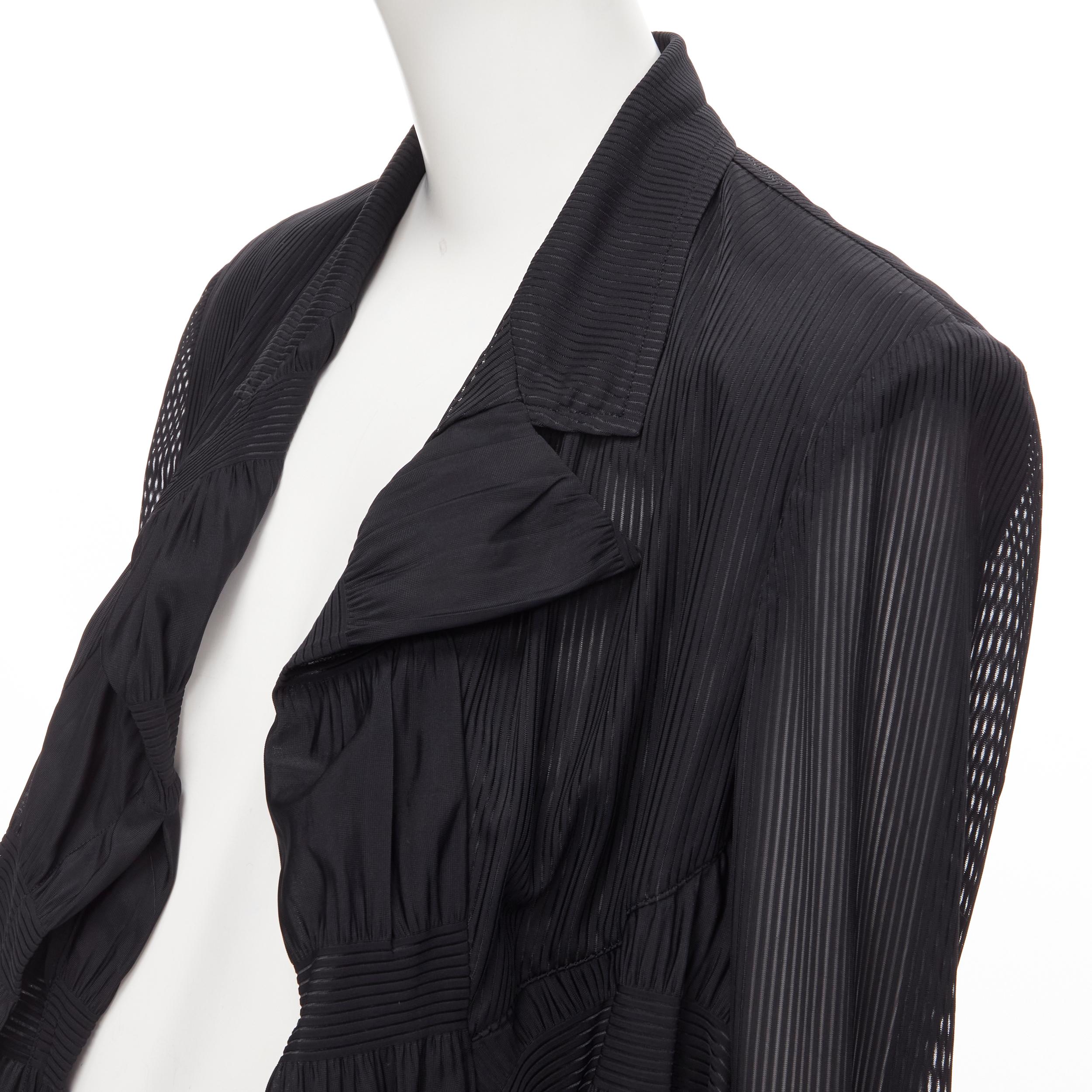 COMME DES GARCONS 1980's black striped sheer ruffle cropped blazer jacket S 
Reference: CRTI/A00416 
Brand: Comme Des Garcons 
Collection: 1990's 
Material: Polyester 
Color: Black 
Pattern: Solid Extra 
Detail: Shoulder padded 
Made in: Japan