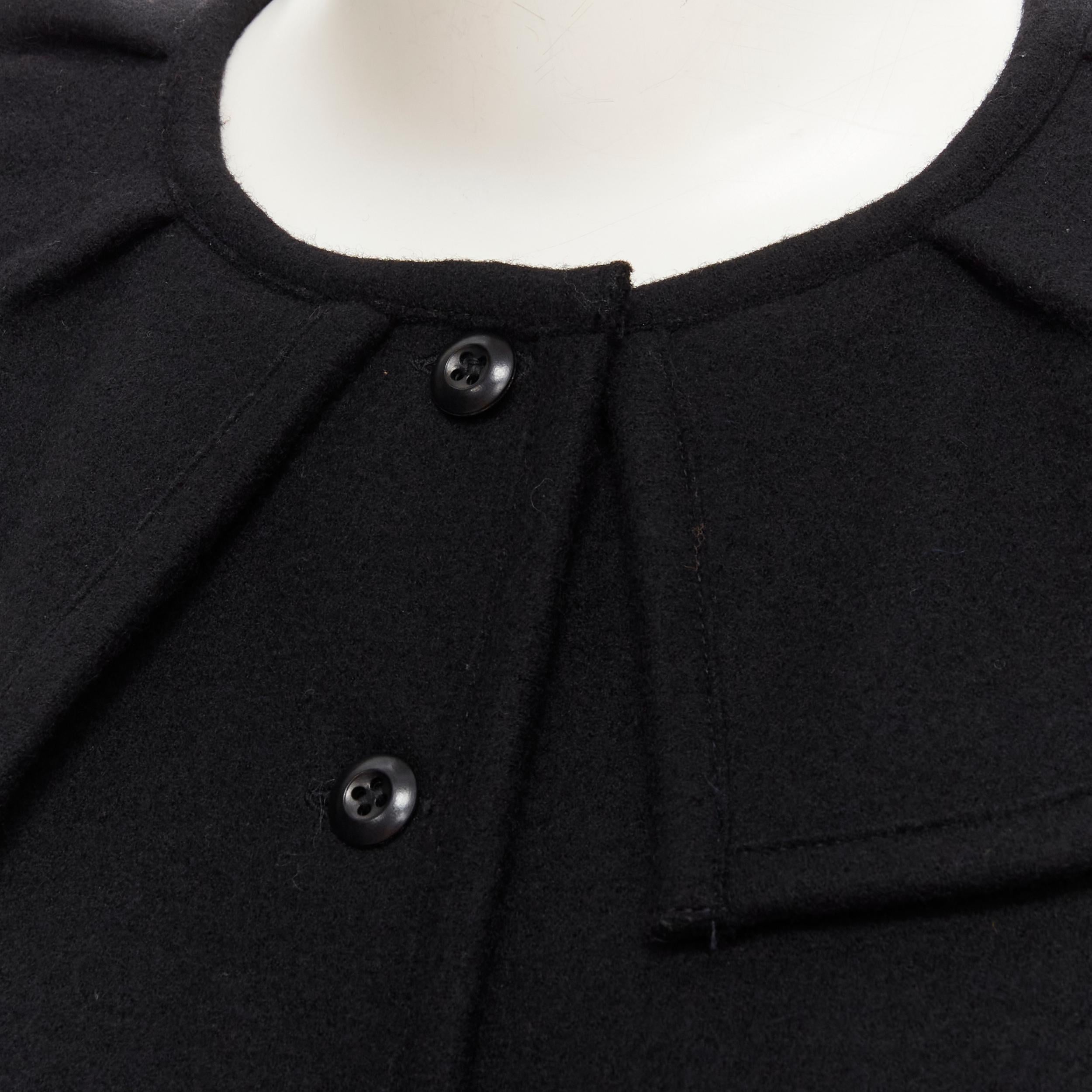 COMME DES GARCONS 1980's Vintage black felt flared collar peplum structured top 
Reference: CRTI/A00699 
Brand: Comme Des Garcons 
Designer: Rei Kawakubo 
Collection: 1980s 
Material: Wool 
Color: Black 
Pattern: Solid 
Closure: Button 
Made in: