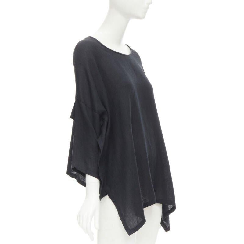 COMME DES GARCONS 1980s Vintage black linen square shorter back loose top S
Reference: CRTI/A00623
Brand: Comme Des Garcons
Designer: Rei Kawakubo
Collection: 1980s
Material: Linen, Blend
Color: Black
Pattern: Solid
Extra Details: Scoop neckline.