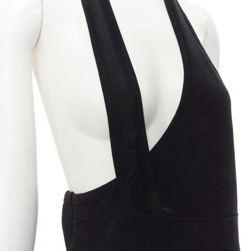 COMME DES GARCONS 1980s Vintage black nylon cotton halter bias skirt dress
Reference: CRTI/A00647
Brand: Comme Des Garcons
Designer: Rei Kawakubo
Collection: 1980s
Material: Rayon, Cotton
Color: Black
Pattern: Solid
Extra Details: Halter shoulder