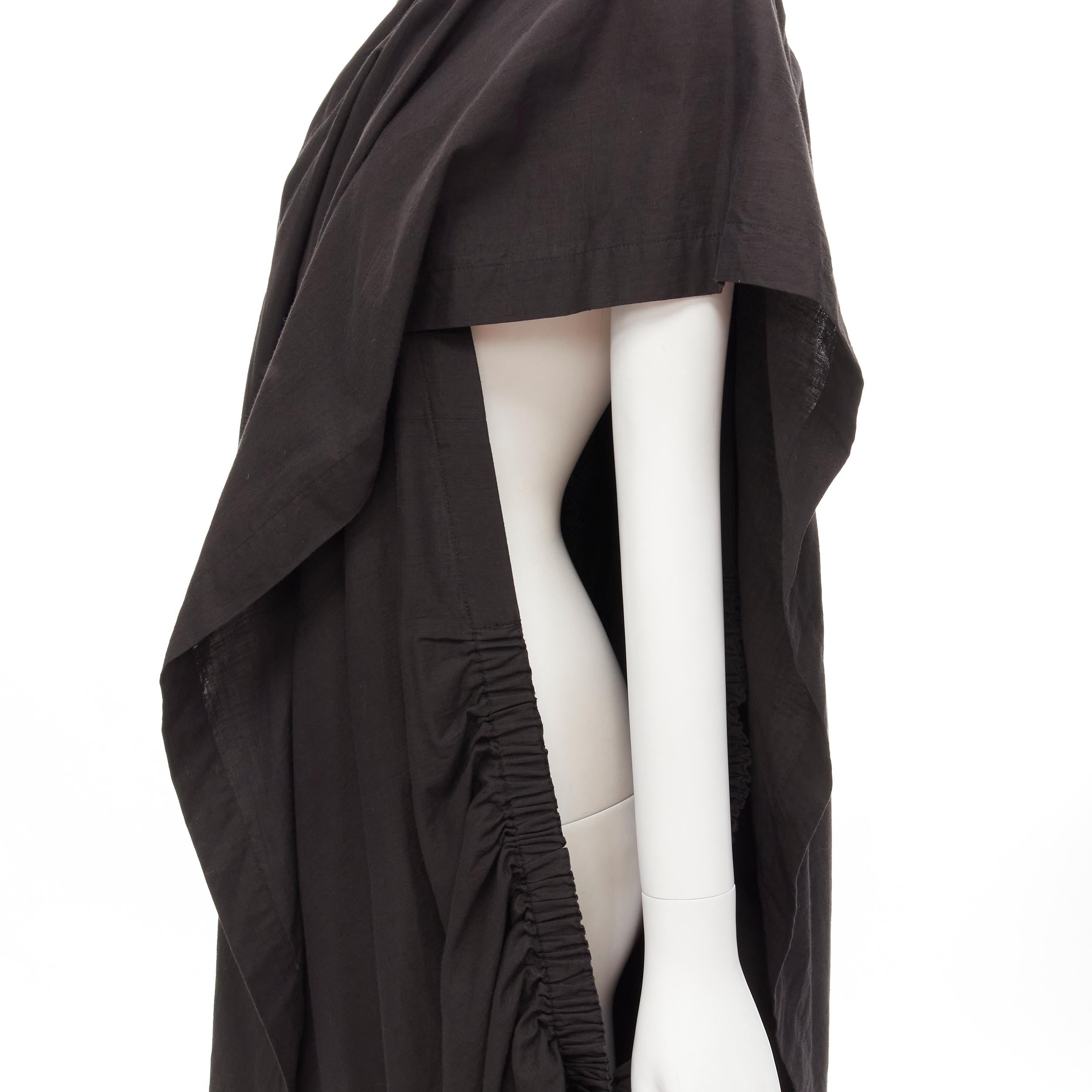 COMME DES GARCONS 1980's Vintage black washed asymmetric draped cocoon dress 
Reference: CRTI/A00695 
Brand: Comme Des Garcons 
Designer: Rei Kawakubo 
Collection: 1980's 
Material: Cotton 
Color: Black 
Pattern: Solid 
Extra Detail: Elasticated