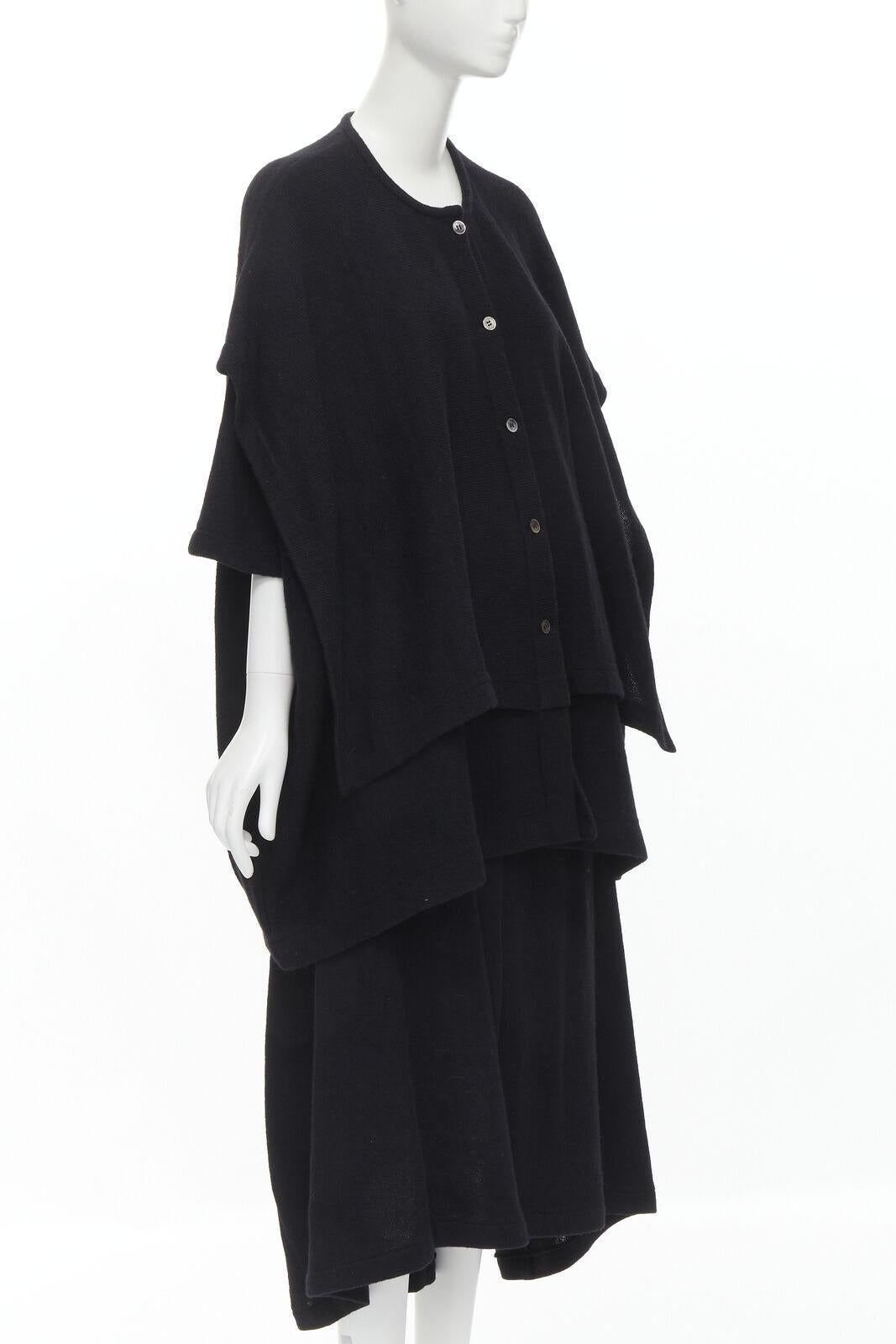 COMME DES GARCONS 1980's Vintage black wool trapeze layered sweater skirt set M
Reference: CRTI/A00593
Brand: Comme Des Garcons
Designer: Rei Kawakubo
Collection: 1980s
Material: Wool, Blend
Color: Black
Pattern: Solid
Closure: Button
Extra Details: