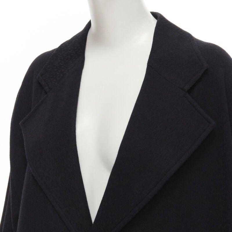 COMME DES GARCONS 1980's Vintage black wool wide cut oversized asymmetric blazer
Reference: CRTI/A00684
Brand: Comme Des Garcons
Designer: Rei Kawakubo
Collection: 1980s
Material: Wool
Color: Black
Pattern: Solid
Closure: Button
Extra Details: