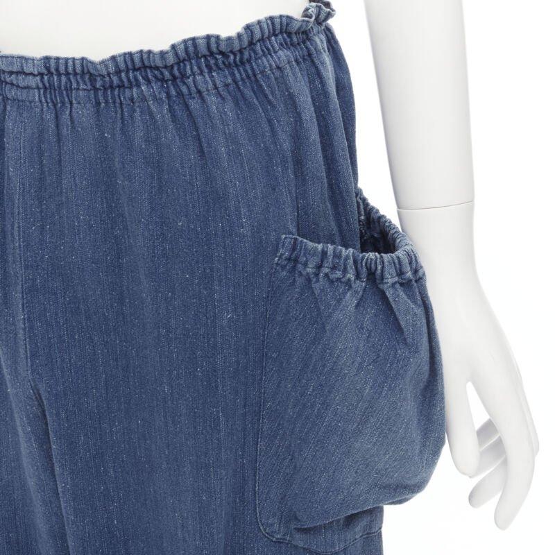 COMME DES GARCONS 1980's Vintage blue washed denim cargo  bubble jeans
Reference: CRTI/A00663
Brand: Comme Des Garcons
Designer: Rei Kawakubo
Collection: 1980s
Material: Cotton
Color: Blue
Pattern: Solid
Closure: Elasticated
Extra Details: Strechy