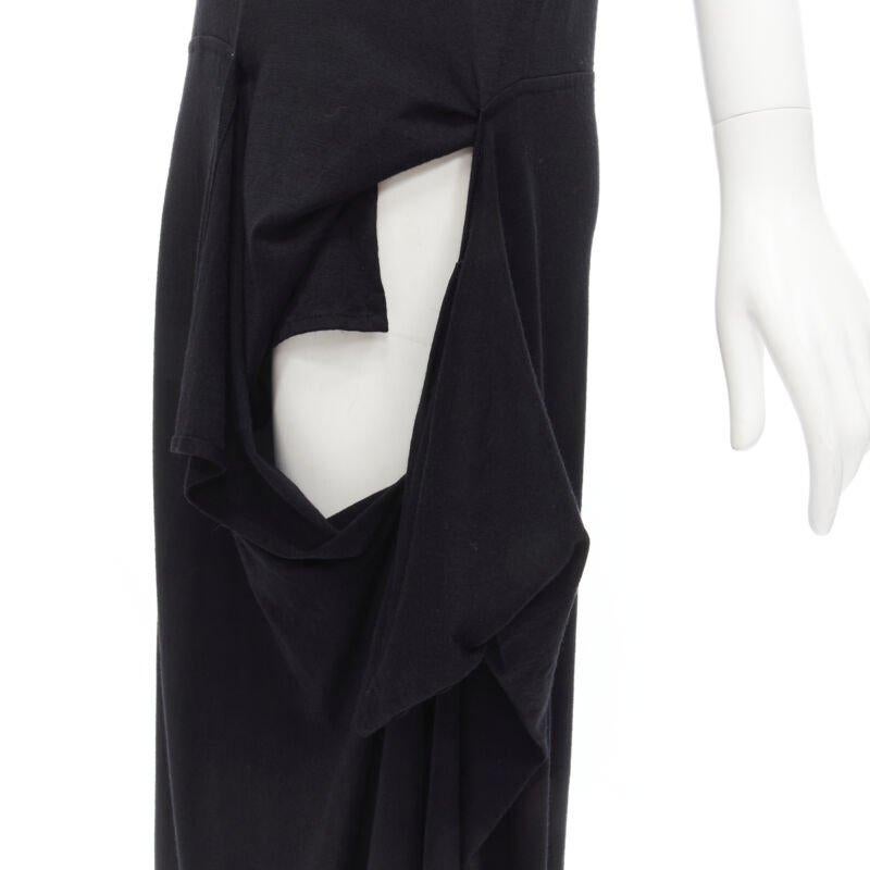 COMME DES GARCONS 1980s Vintage abito midi drappeggiato con dettaglio scoop neck M
Riferimento: CRTI/A00626
Marchio: Comme Des Garcons
Designer: Rei Kawakubo
Collezione: 1980s
Materiale: Lana
Colore: nero
Modello: Tinta unita
Dettagli extra: Collo a