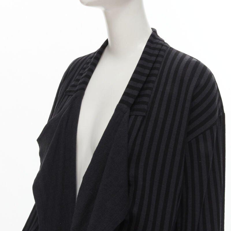 COMME DES GARCONS 1980's Vintage grey black striped wool draped front jacket M
Reference: CRTI/A00671
Brand: Comme Des Garcons
Designer: Rei Kawakubo
Collection: 1980s
Material: Wool
Color: Grey, Black
Pattern: Striped
Extra Details: Gathered bundle