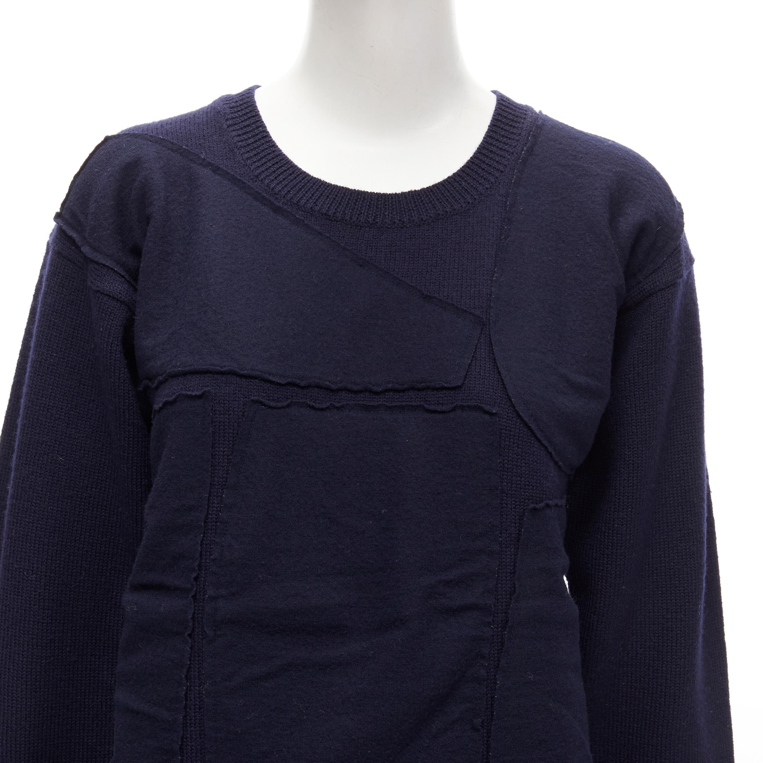 COMME DES GARCONS 1980er Jahre Vintage Pullover aus marineblauer Wolle mit Patchworkmuster
Referenz: TGAS/C01694
Marke: Comme Des Garcons
Designer: Rei Kawakubo
Collection'S: 1980's
MATERIAL: Wolle
Farbe: Blau
Muster: Solide
Verschluss: