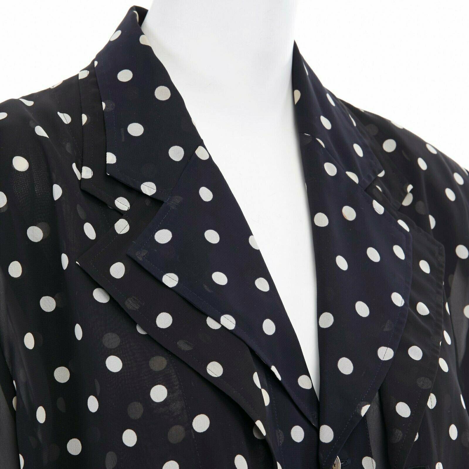 COMME DES GARCONS 1988 black navy polka dot dual layer draped front blazer S
Reference: TGAS/A01157
Brand: Comme Des Garcons
Designer: Rei Kawakubo
Material: Polyester
Color: Black
Pattern: Polka Dot
Made in: Japan

CONDITION:
Condition: Excellent,