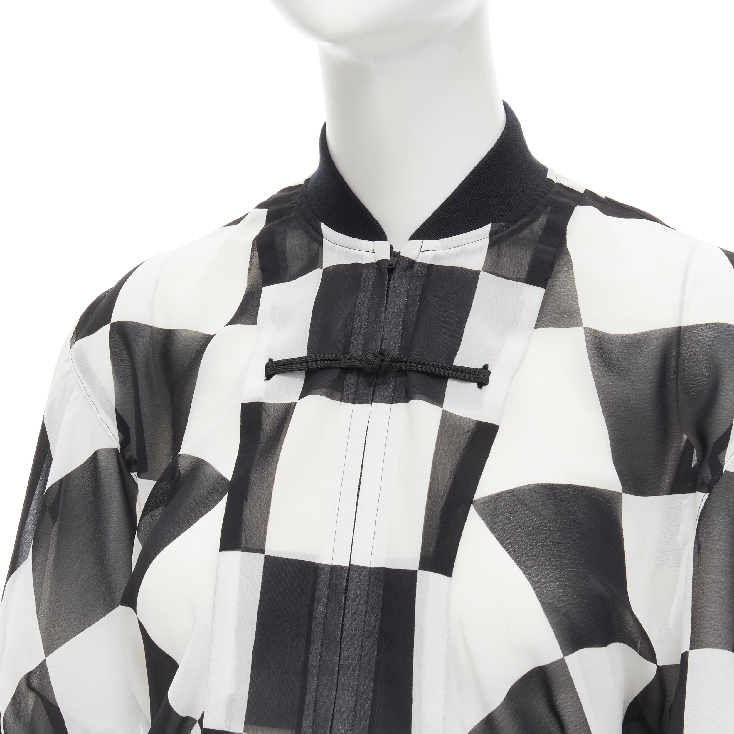 COMME DES GARCONS 1988 Runway black white checkered bomber skirt set S 
Reference: CRTI/A00496 
Brand: Comme Des Garcons 
Designer: Rei Kawakubo 
Collection: 1988 Runway 
Material: Polyester 
Color: Black 
Pattern: Check 
Closure: Zip 
Extra Detail: