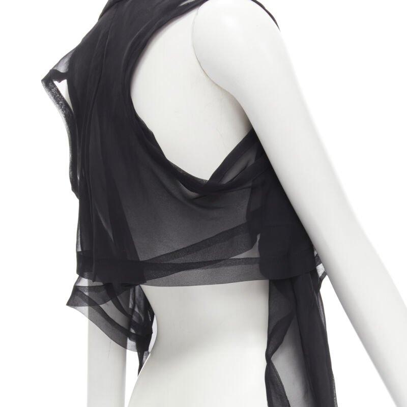 COMME DES GARCONS 1990 Vintage black sheer  deconstructed layered shirt S
Reference: CRTI/A00477
Brand: Comme Des Garcons
Designer: Rei Kawakubo
Collection: 1990
Material: Polyester
Color: Black
Pattern: Solid
Closure: Button
Extra Details: Double