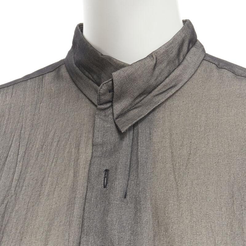 COMME DES GARCONS 1993 Tromp Loeil black faux fastening long sleeve shirt S
Reference: CRTI/A00524
Brand: Comme Des Garcons
Designer: Rei Kawakubo
Collection: 1993
Material: Cotton
Color: Black
Pattern: Solid
Closure: Zip
Extra Details: Tromp Loeil