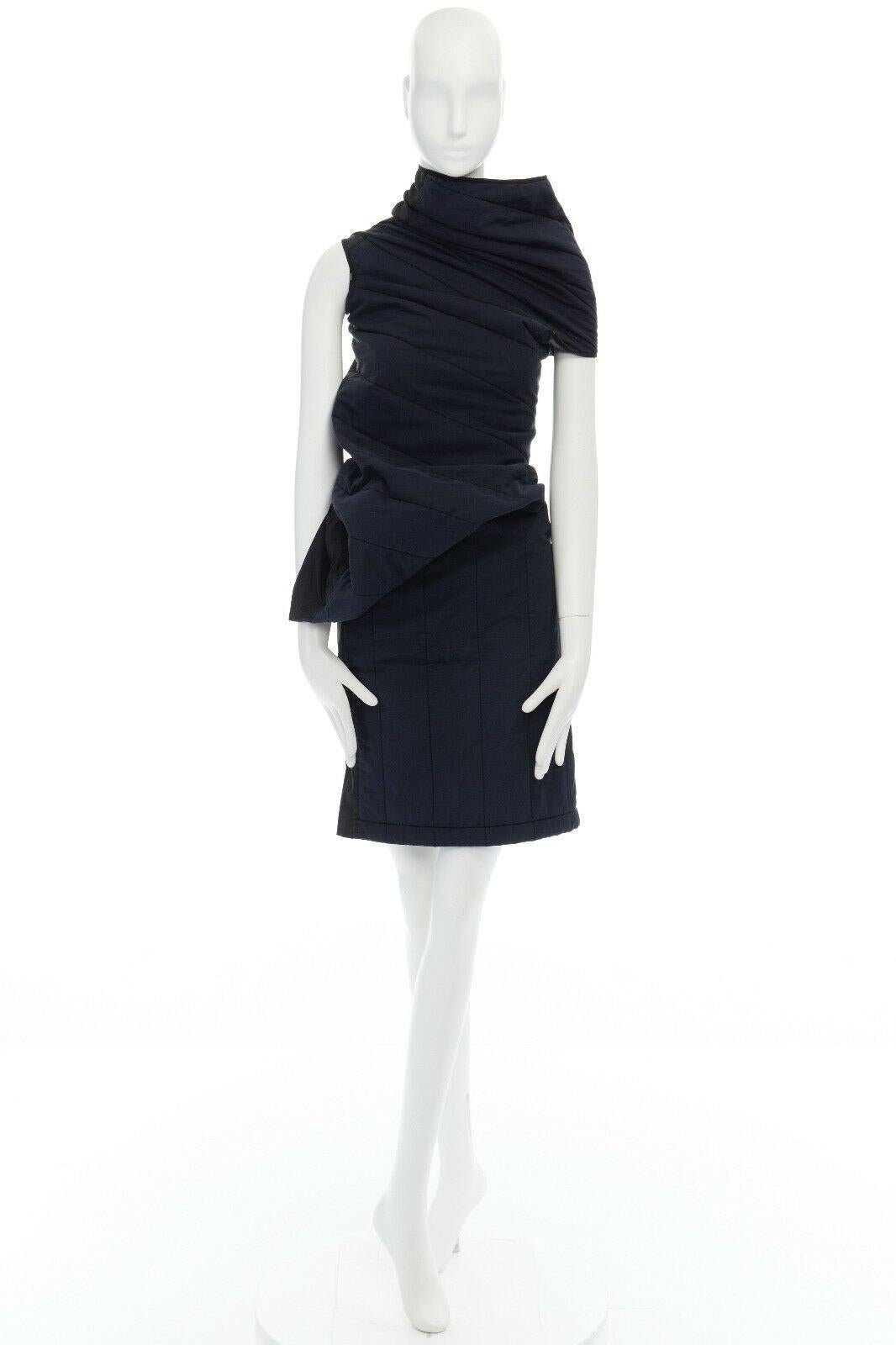 COMME DES GARCONS 1996 Lumps Bumps navy blue padded irregular bodycon dress S 
Reference: TGAS/A02360 
Brand: Comme Des Garcons 
Designer: Rei Kawakubo 
Collection: AD1996 
Material: Cotton 
Color: Navy 
Pattern: Solid
 Extra Detail: FROM THE AD1996