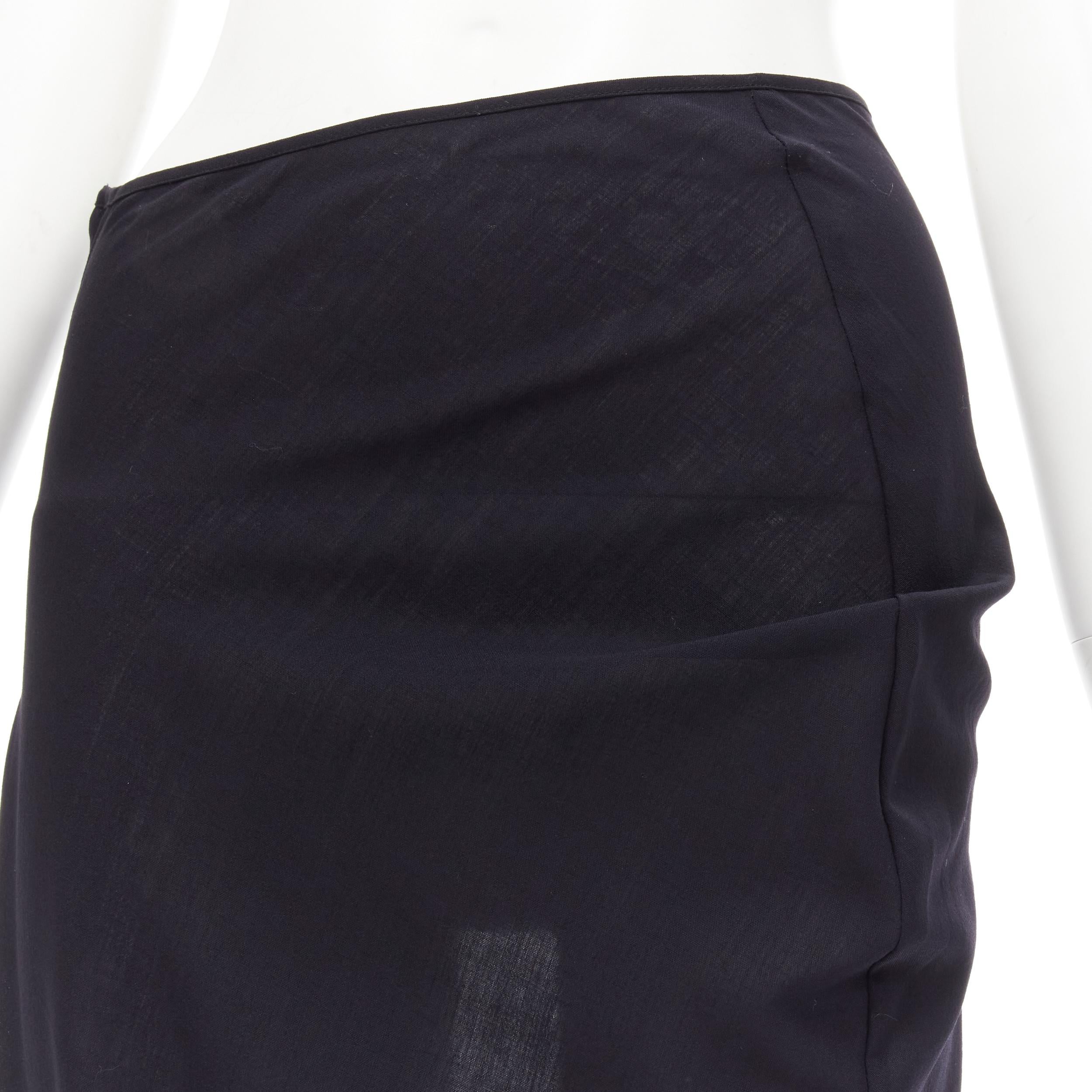 COMME DES GARCONS 1996 Vintage Lumps Bumps black bias asymmetric cut skirt M 
Reference: CRTI/A00638 
Brand: Comme Des Garcons 
Designer: Rei Kawakubo 
Collection: 1996
Material: Wool 
Color: Black 
Pattern: Solid 
Closure: Zip 
Extra Detail:
