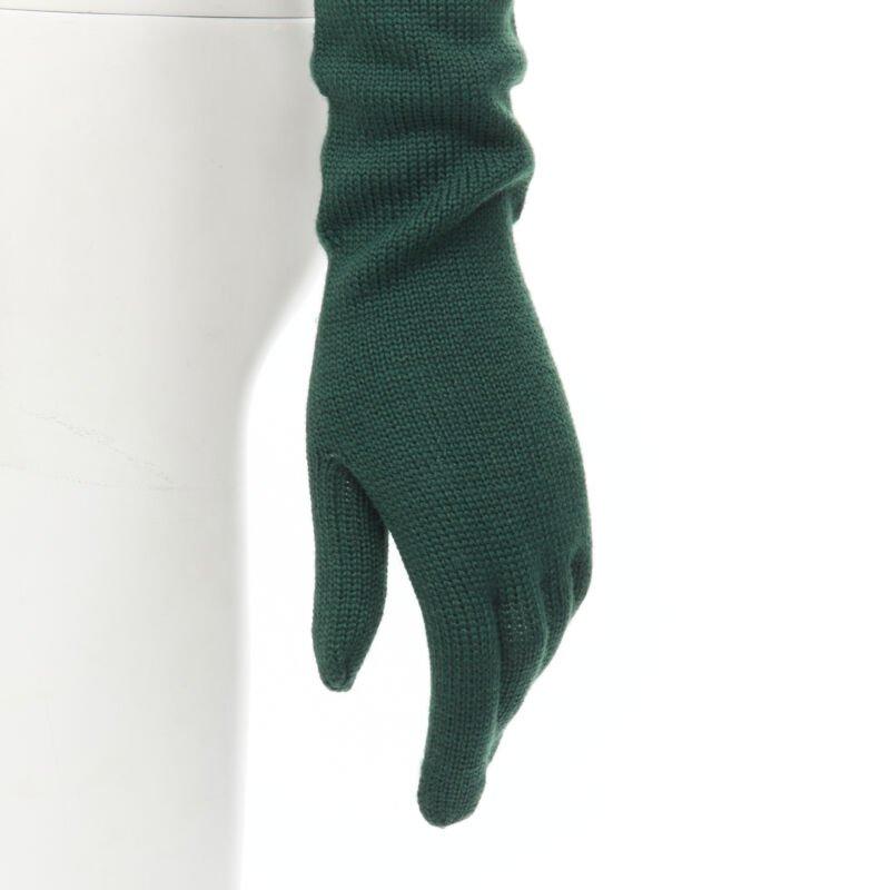 COMME DES GARCONS 1996 Vintage Runway green wool full opera gloves rare
Reference: CRTI/A00718
Brand: Comme Des Garcons
Designer: Rei Kawakubo
Model: Wool opera gloves
Collection: 1996 - Runway
Material: Wool
Color: Green
Pattern: Solid
Extra