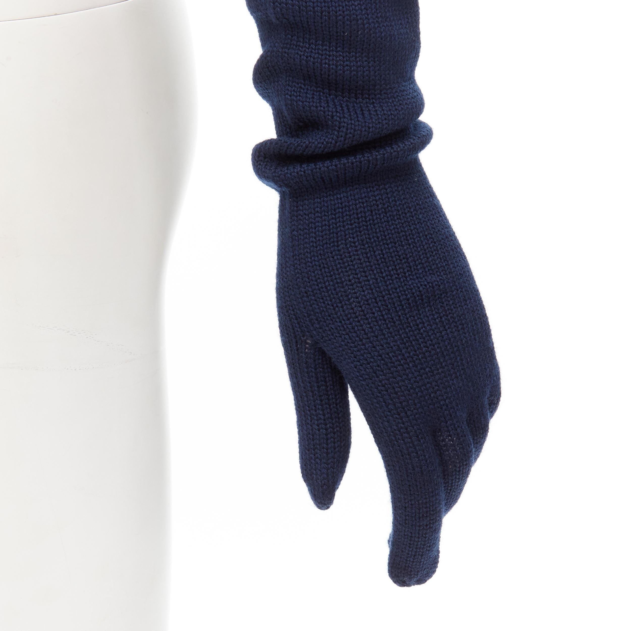 COMME DES GARCONS 1996 Vintage Runway navy blue wool knit full opera gloves rare 
Reference: CRTI/A00719 
Brand: Comme Des Garcons 
Designer: Rei Kawakubo 
Collection: AD1996 Runway 
Material: Wool 
Color: Navy 
Pattern: Solid 
Extra Detail: Wool