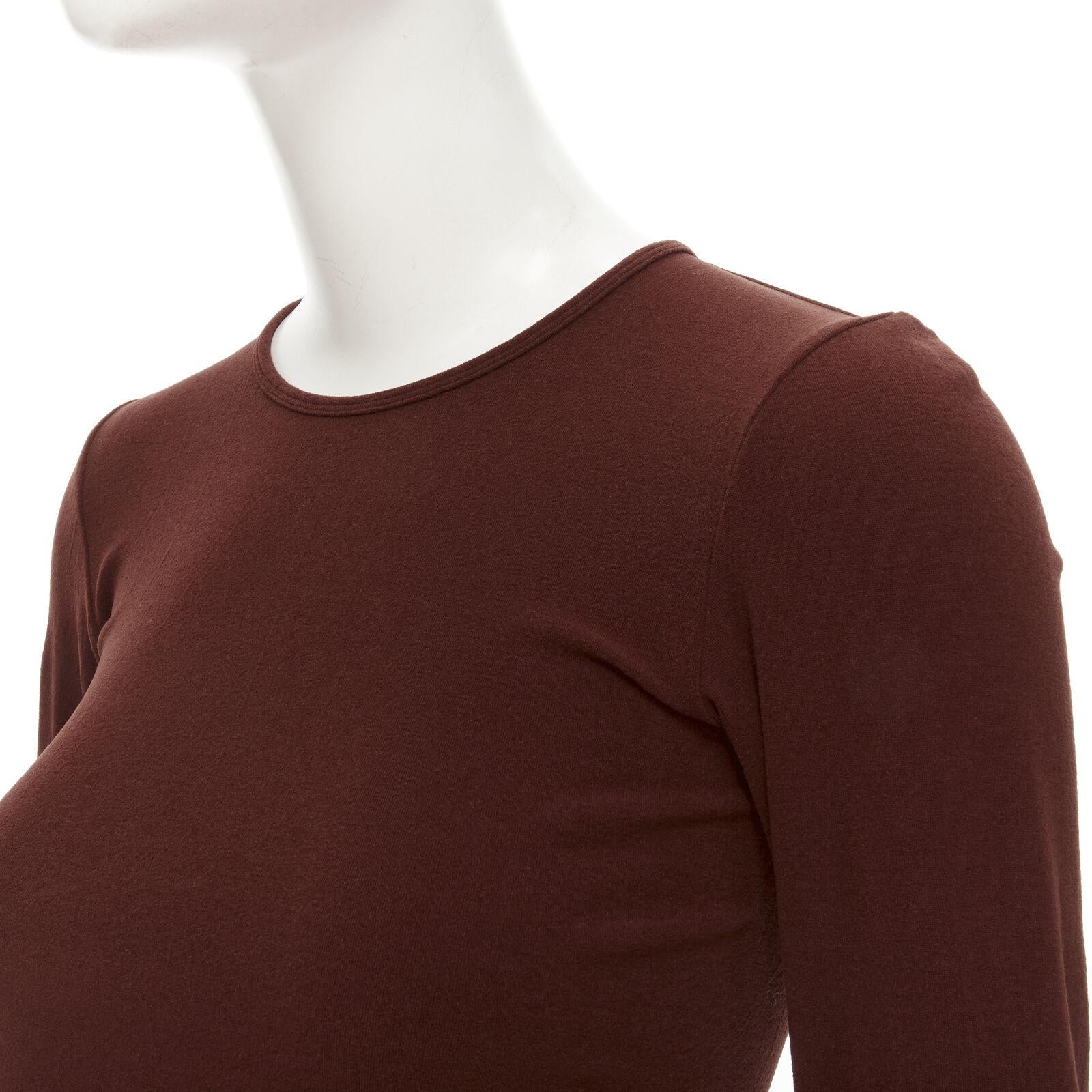 COMME DES GARCONS 1997 Lumps Bumps brown nylon blend crew neck knit cropped top
Reference: CRTI/A00734
Brand: Comme Des Garcons
Designer: Rei Kawakubo
Collection: 1997
Material: Nylon, Blend
Color: Brown
Pattern: Solid
Closure: Pull On
Made in: