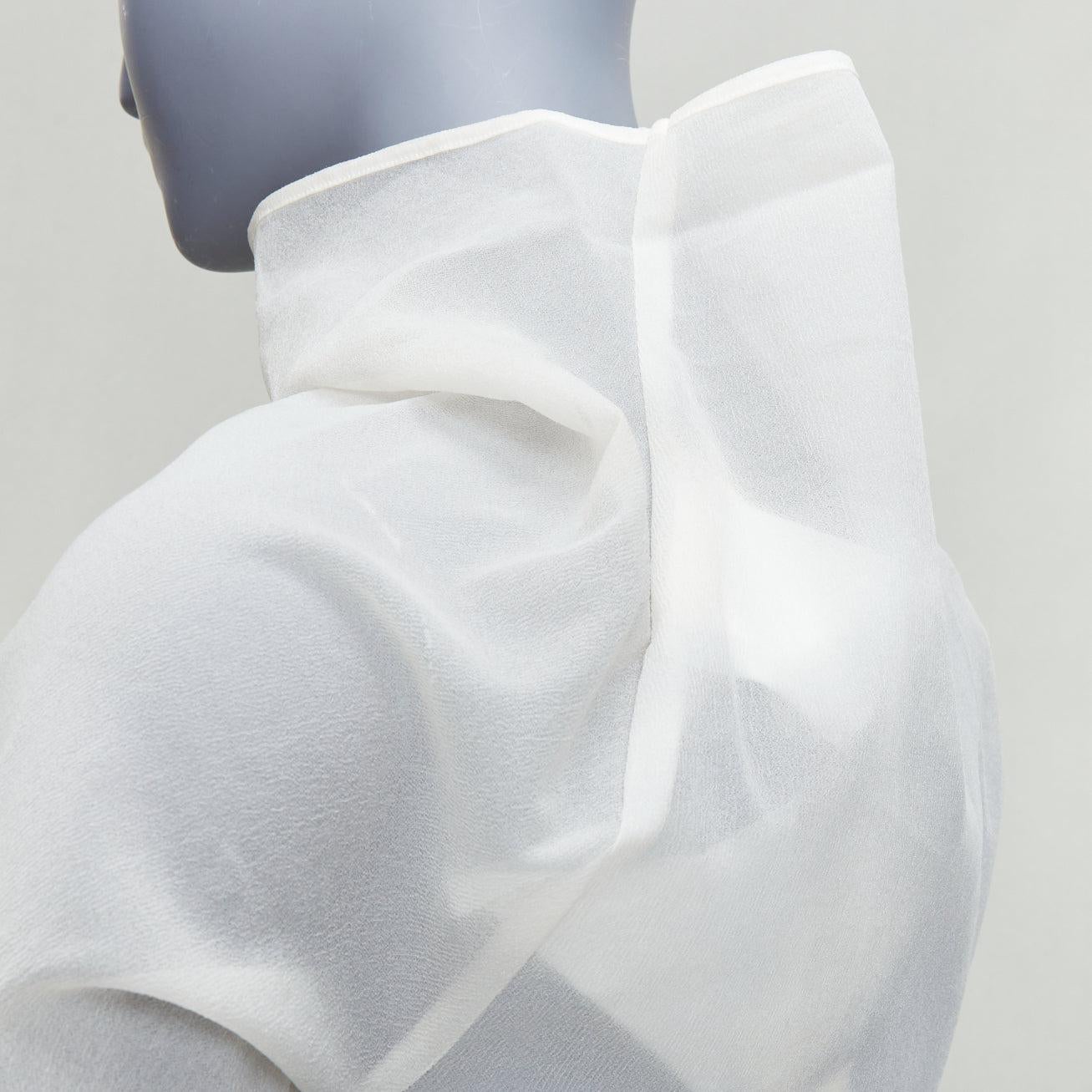 COMME DES GARCONS 1997 Lumps Bumps off white sheer turtleneck top S
Reference: TGAS/E00230
Brand: Comme Des Garcons
Collection: SS 1997 Lumps Bumps
Material: Polyester, Blend
Color: Off White
Pattern: Solid
Closure: Slip On
Extra Details: Bias cut
