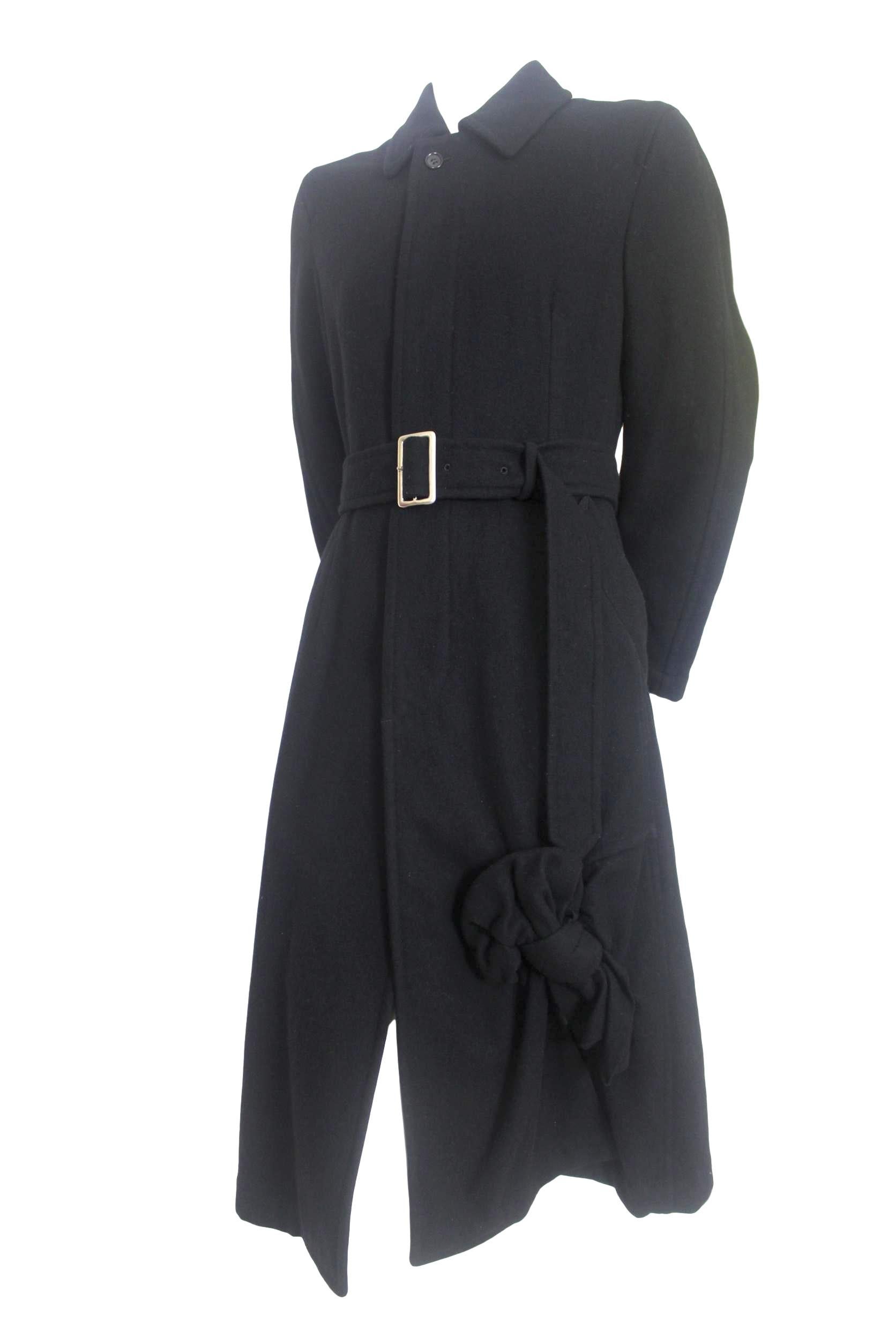 Comme des Garcons 2006 Collection
Wool Coat with Twisted Bow Decoration
Labelled size S