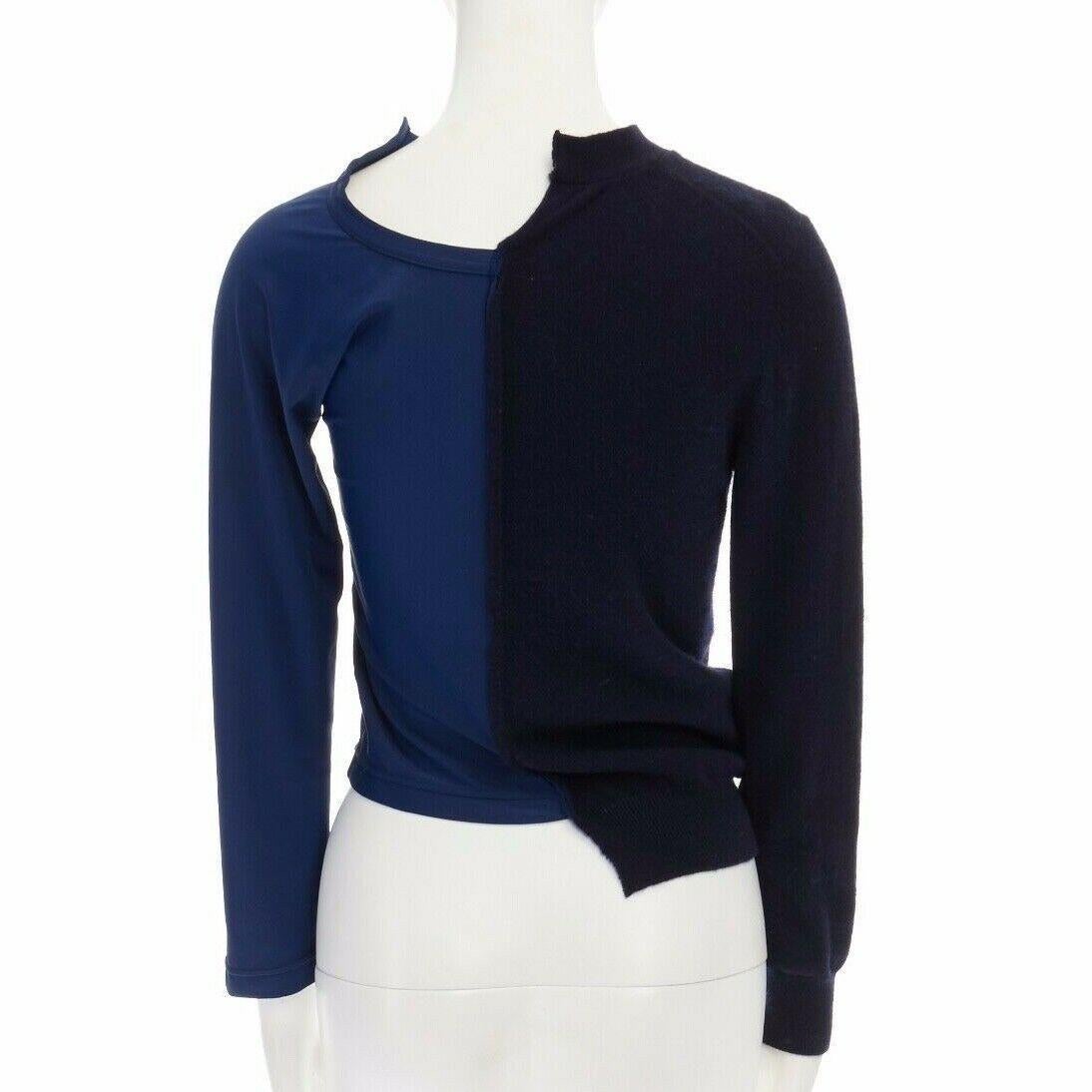 COMME DES GARCONS 2007 navy blue wool polyester hybrid deconstructed cardigan S
COMME DES GARCONS
Wool, polyester, polyurethane. Navy blue wool. 
Sportive polyester blend material. Hybrid deconstructed cardigan. 
Made in Japan.

CONDITION
Very good,