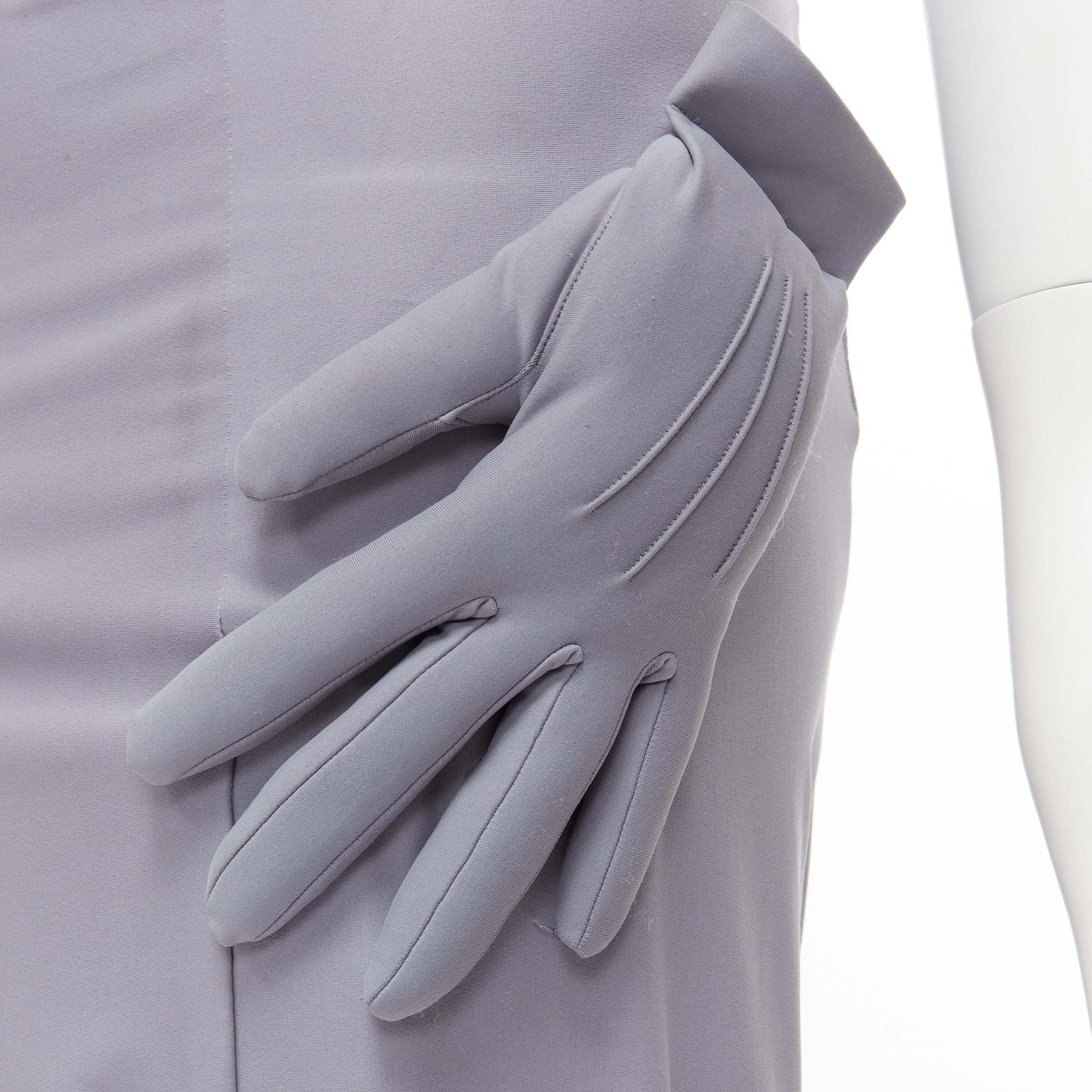 COMME DES GARCONS 2007 Runway purple Mickey Mouse gloves dropped crotch pants S Reference: CRTI/A00566 
Brand: Comme Des Garcons 
Designer: Rei Kawakubo 
Collection: 2007 Runway 
Material: Polyester 
Color: Grey 
Pattern: Solid 
Extra Detail: