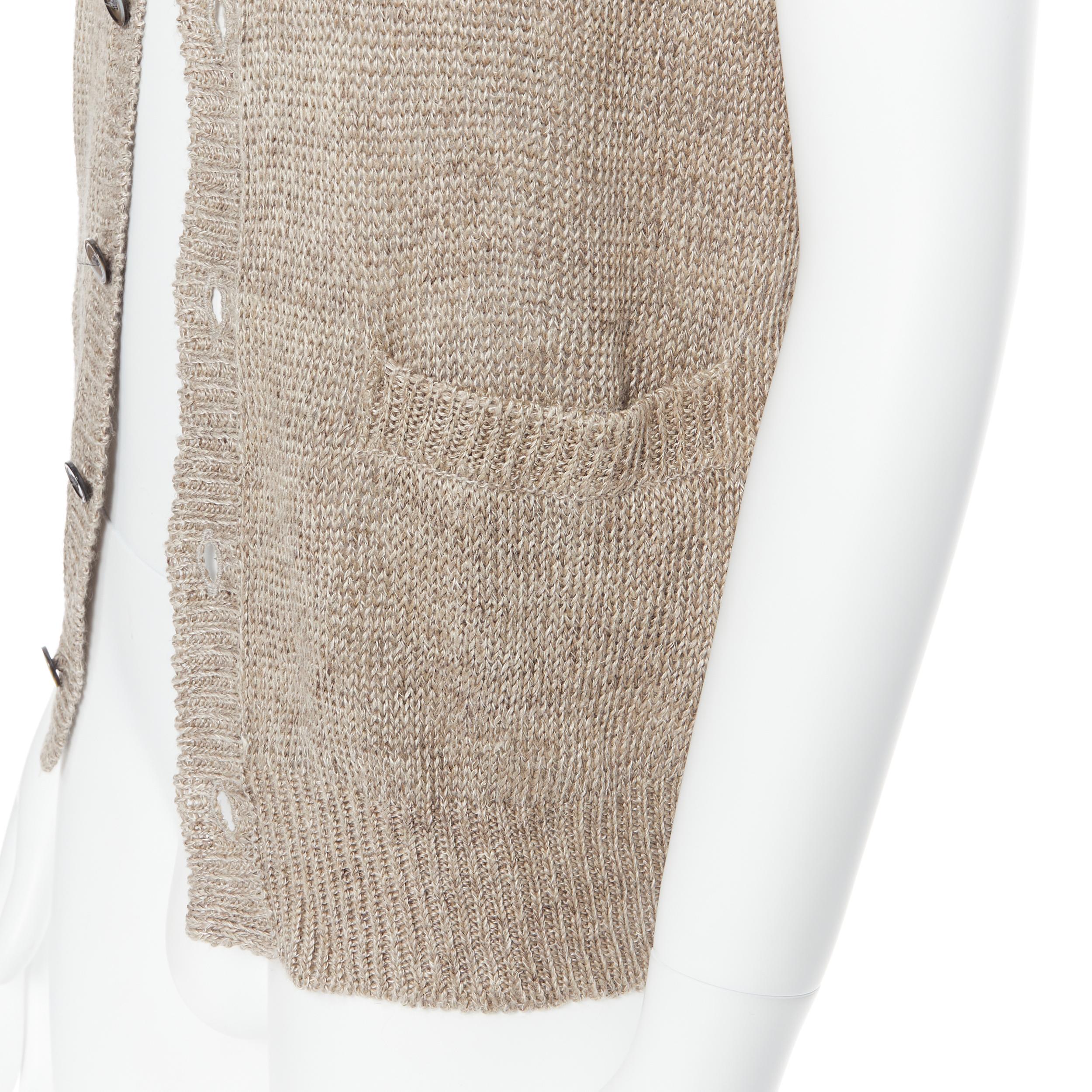 COMME DES GARCONS 2009 100% linen beige knit cardigan vest sweater M Reference: PRCN/A00079 
Brand: Comme Des Garcons 
Designer: Rei Kawakubo 
Material: Linen 
Color: Brown 
Pattern: Solid 
Closure: Button 
Extra Detail: 100% linen. Contrast