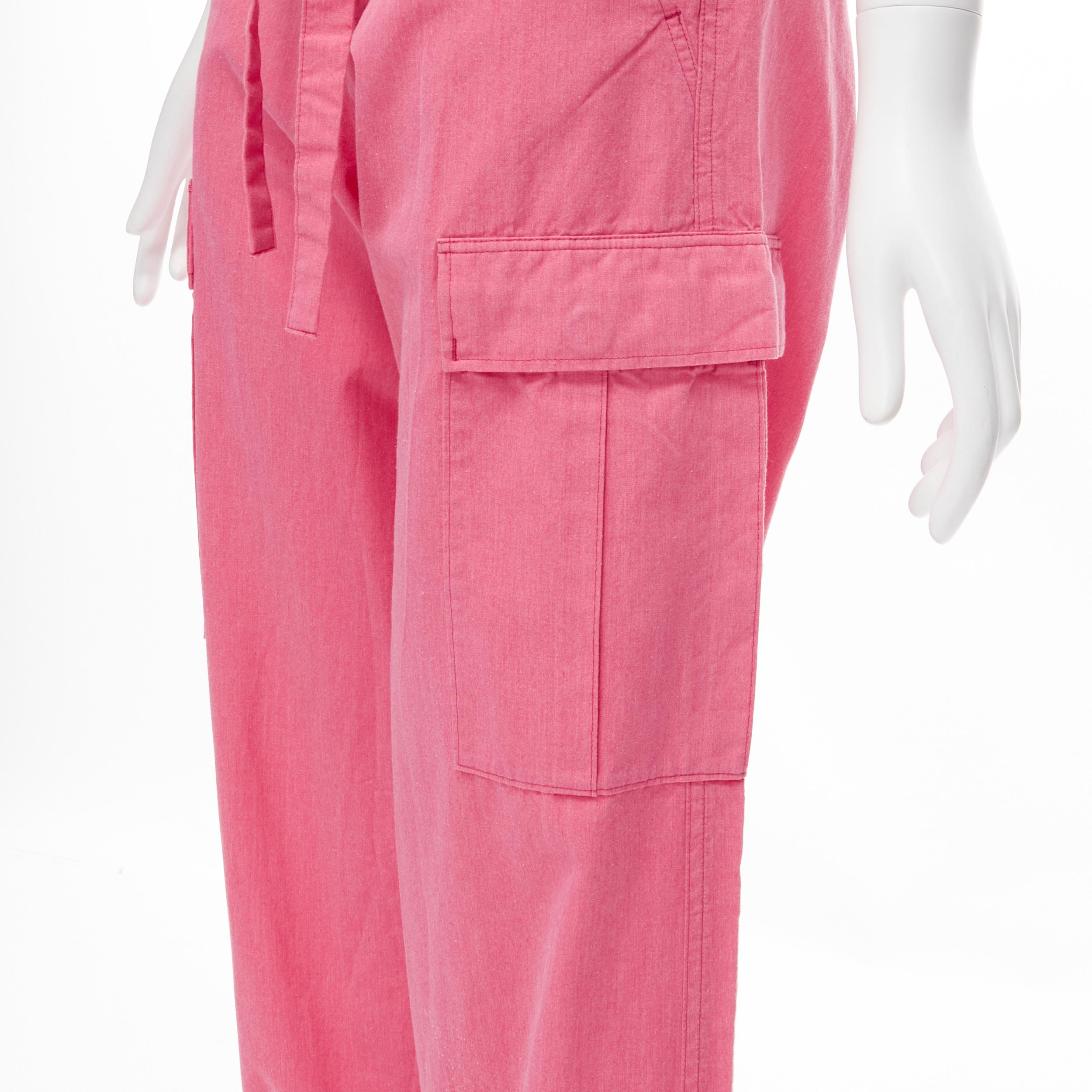 COMME DES GARCONS 2012 pink overdyed cotton wide leg cargo pants S 
Reference: CRTI/A00441 
Brand: Comme Des Garcons 
Collection: 2012 
Material: Cotton 
Color: Pink 
Pattern: Solid 
Closure: Button 
Extra Detail: Detachable tie belt. Cargo pockets.