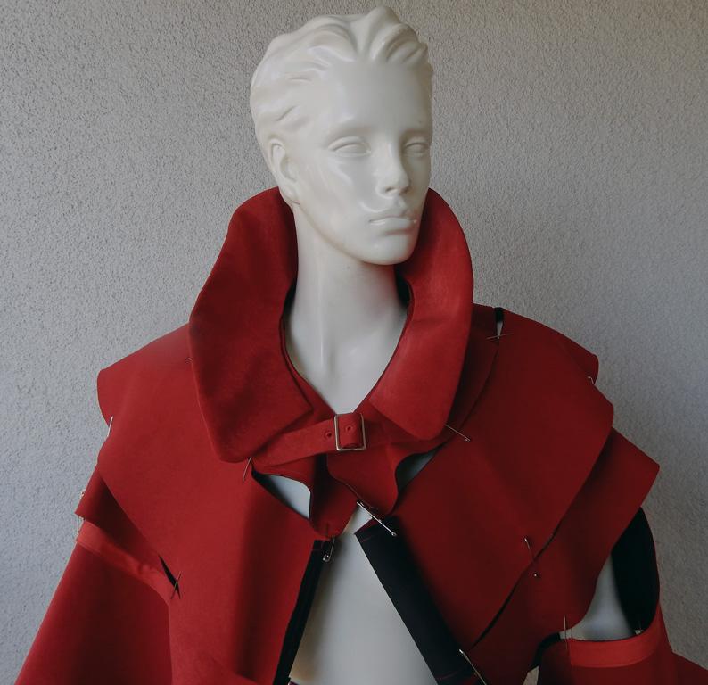 Rei Kawakubo for Comme des Garcons S/S 2015 offers a runway collection of designs in widely different textures and silhouettes all in identical shade of explosive poppy red.  Known as the 